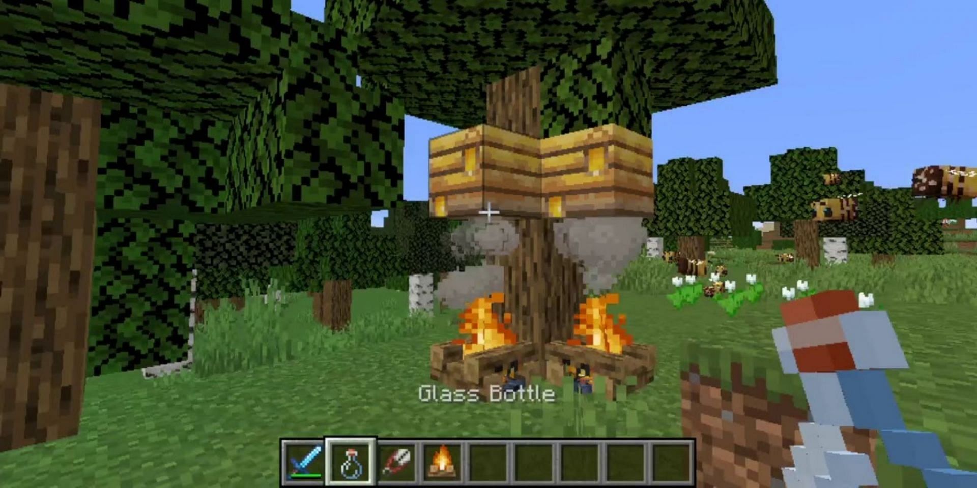 A campfire will appease the bees so players can get the honey and honeycombs (Image via Minecraft)