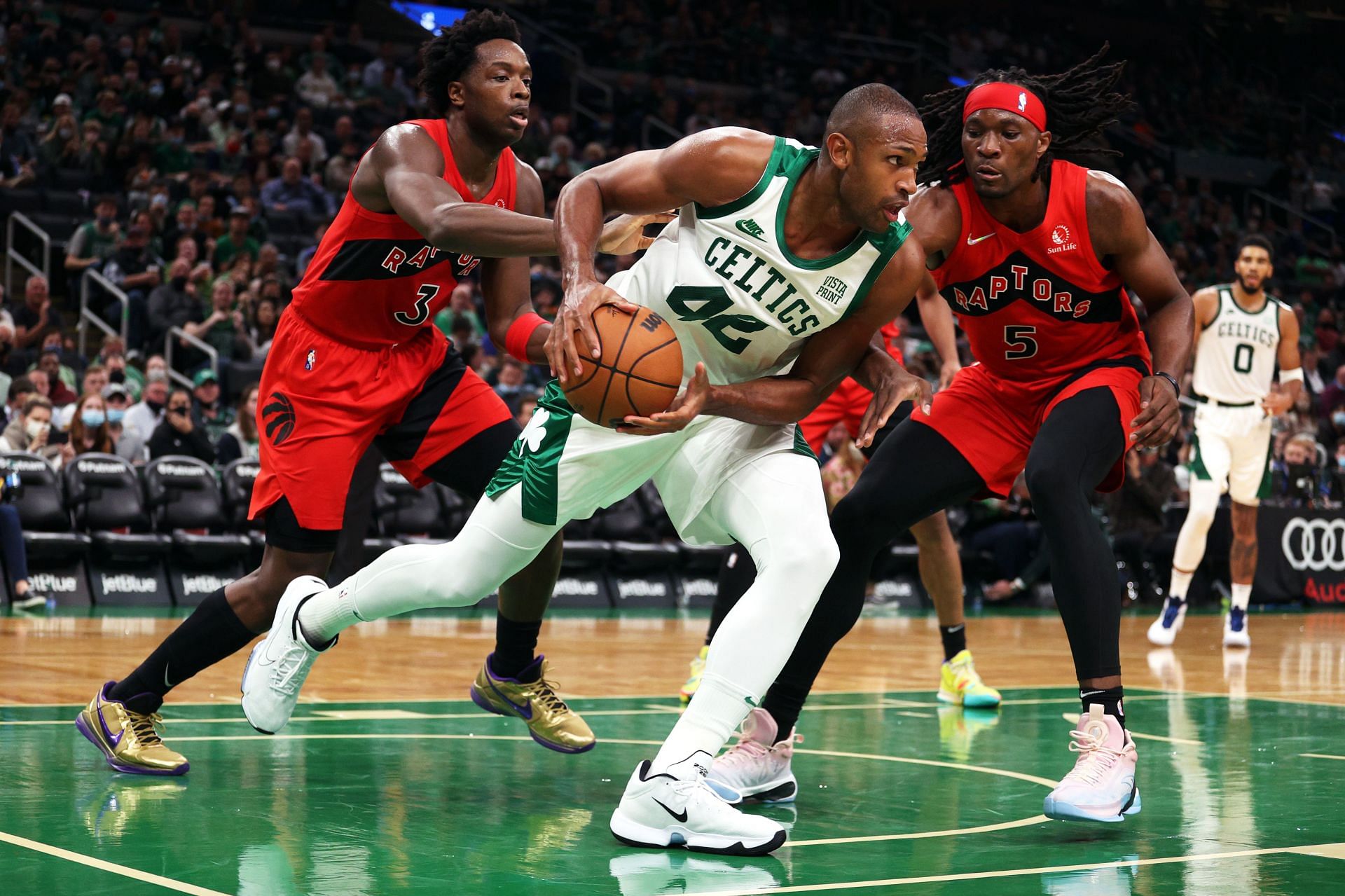 Al Horford of the Boston Celtics takes on the Toronto Raptors