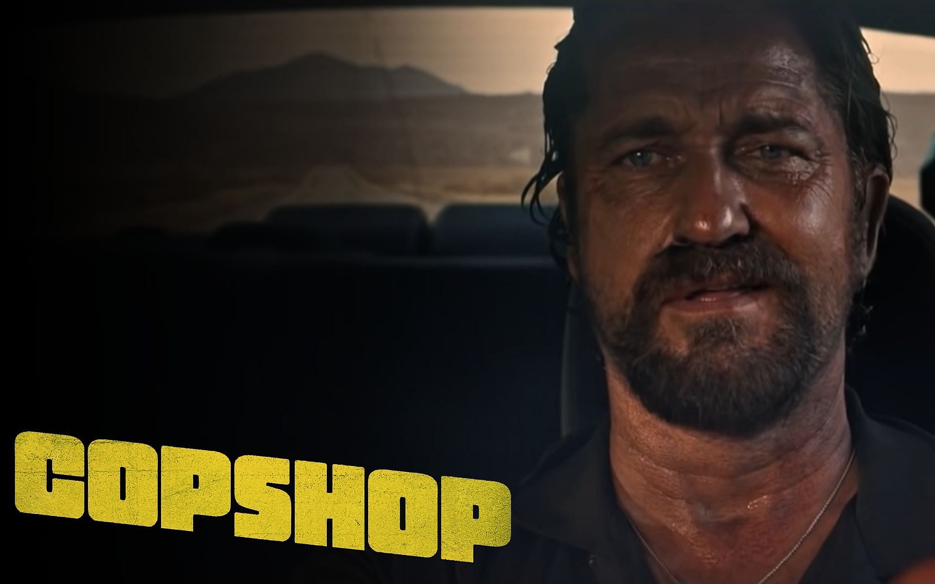 Still from Copshop (Image via ONE Media/ Youtube)
