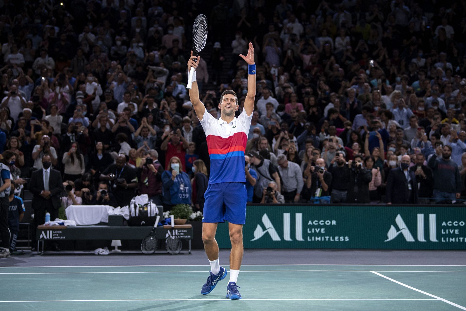 Novak Djokovic celebrates after winning the 2021 Rolex Paris Masters