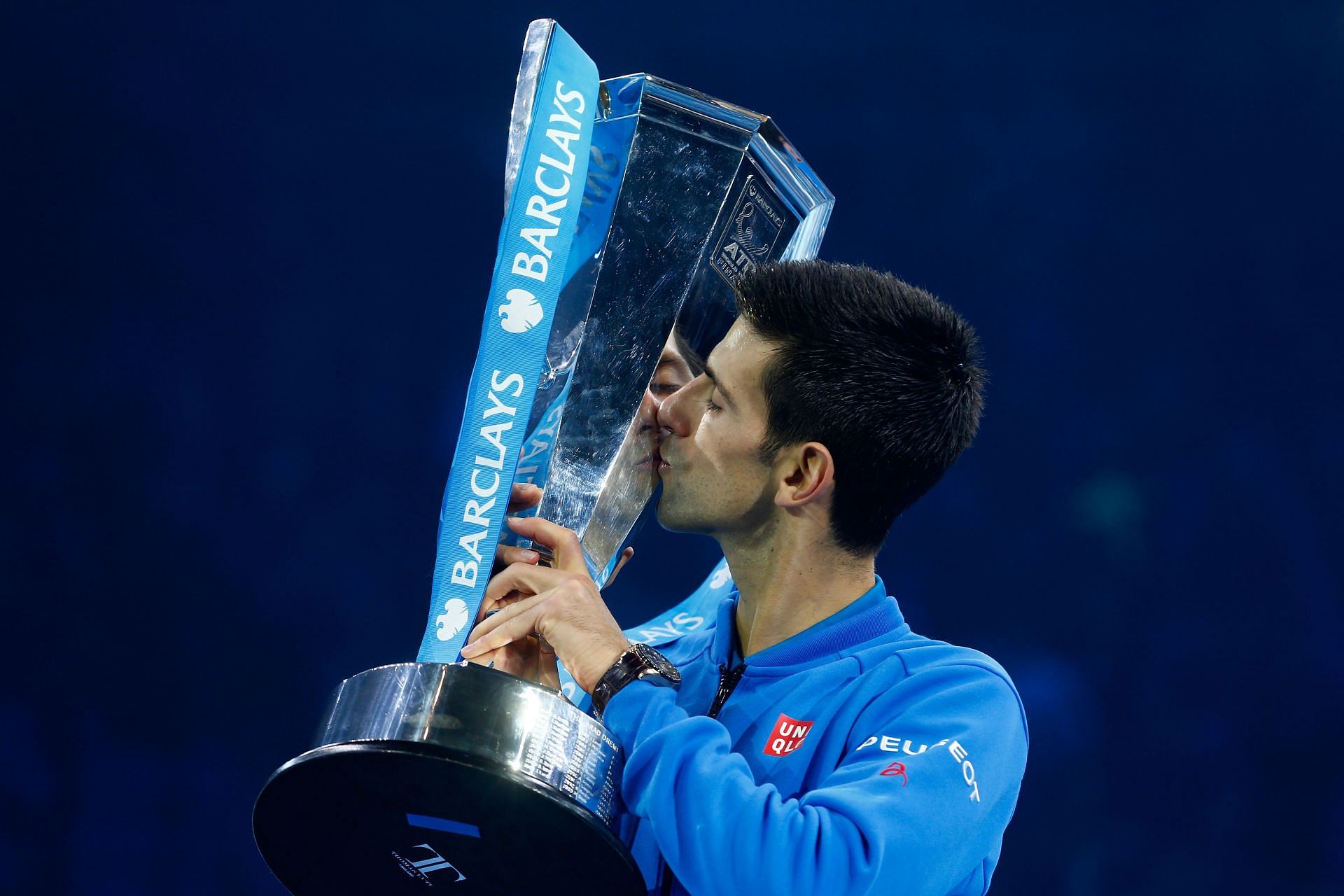 Novak Djokovic celebrates his fifth year-end championships victory at the 2015 ATP Finals