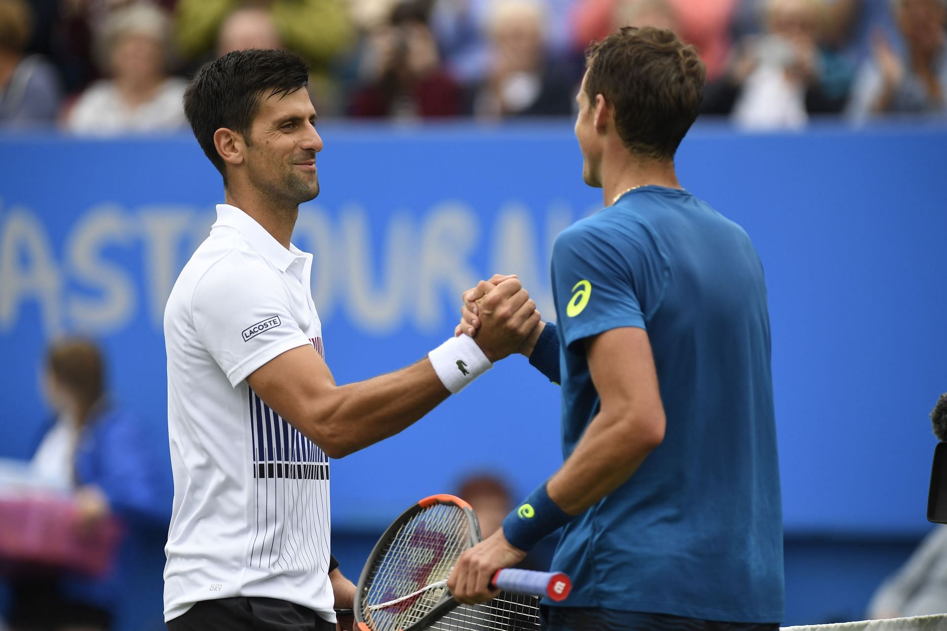 Novak Djokovic and Vasek Pospisil at the Aegon International Eastbourne