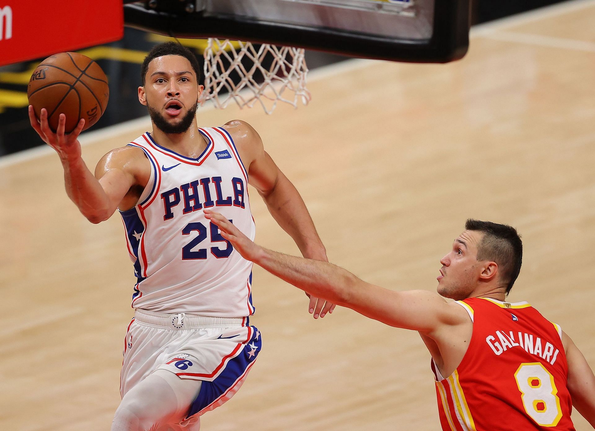 Ben Simmons #25 of the Philadelphia 76ers drives against Danilo Gallinari #8 of the Atlanta Hawks during the first half of game 3 of the Eastern Conference Semifinals at State Farm Arena on June 11, 2021 in Atlanta, Georgia.