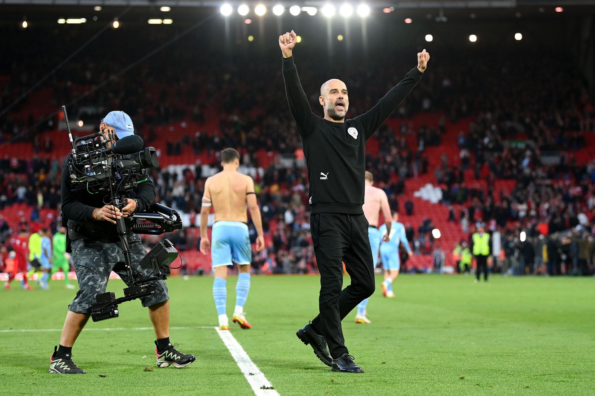 Manchester City manager Pep Guardiola celebrates a win against Liverpool.