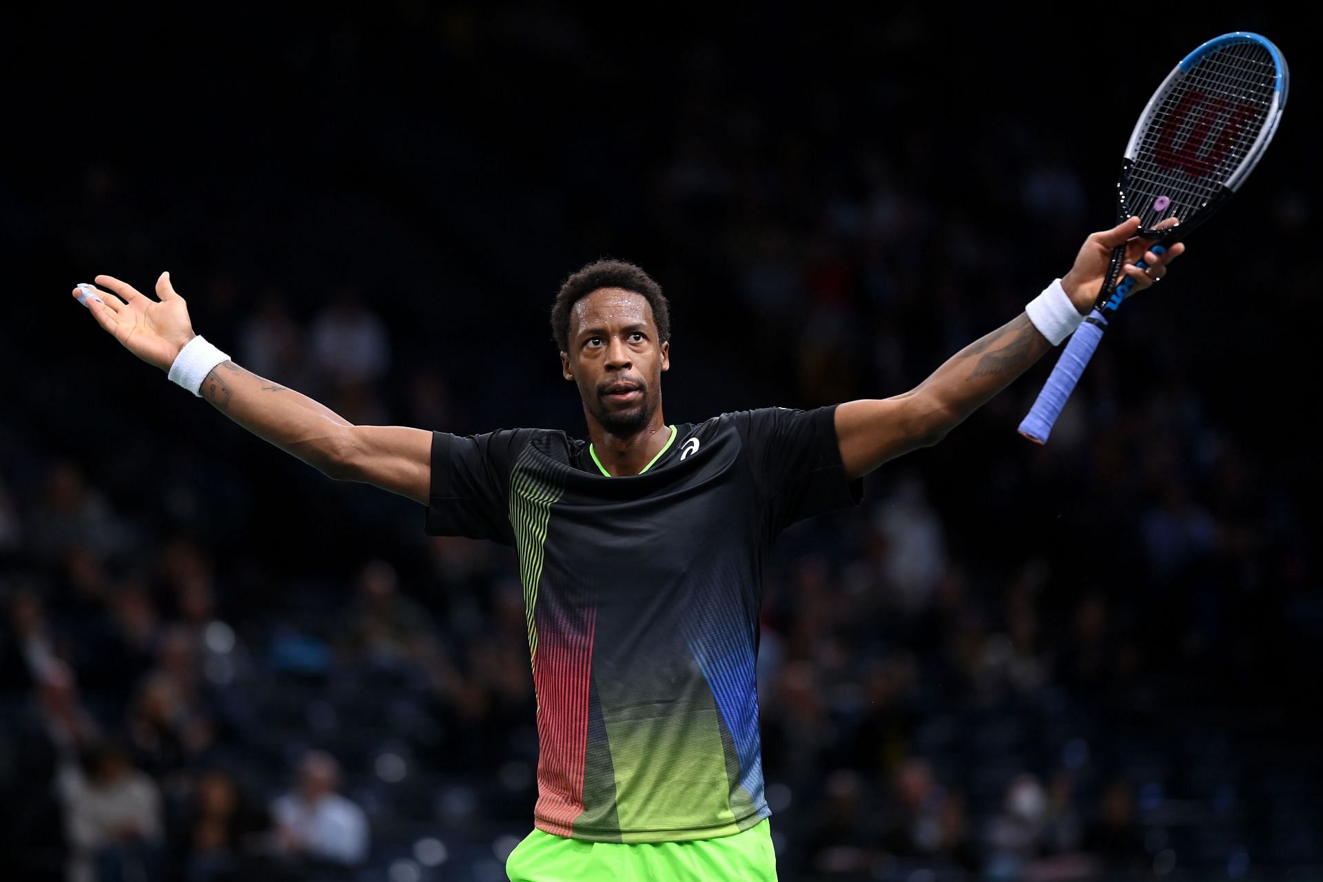 Gael Monfils celebrates a point in his second round match against Adrian Mannarino