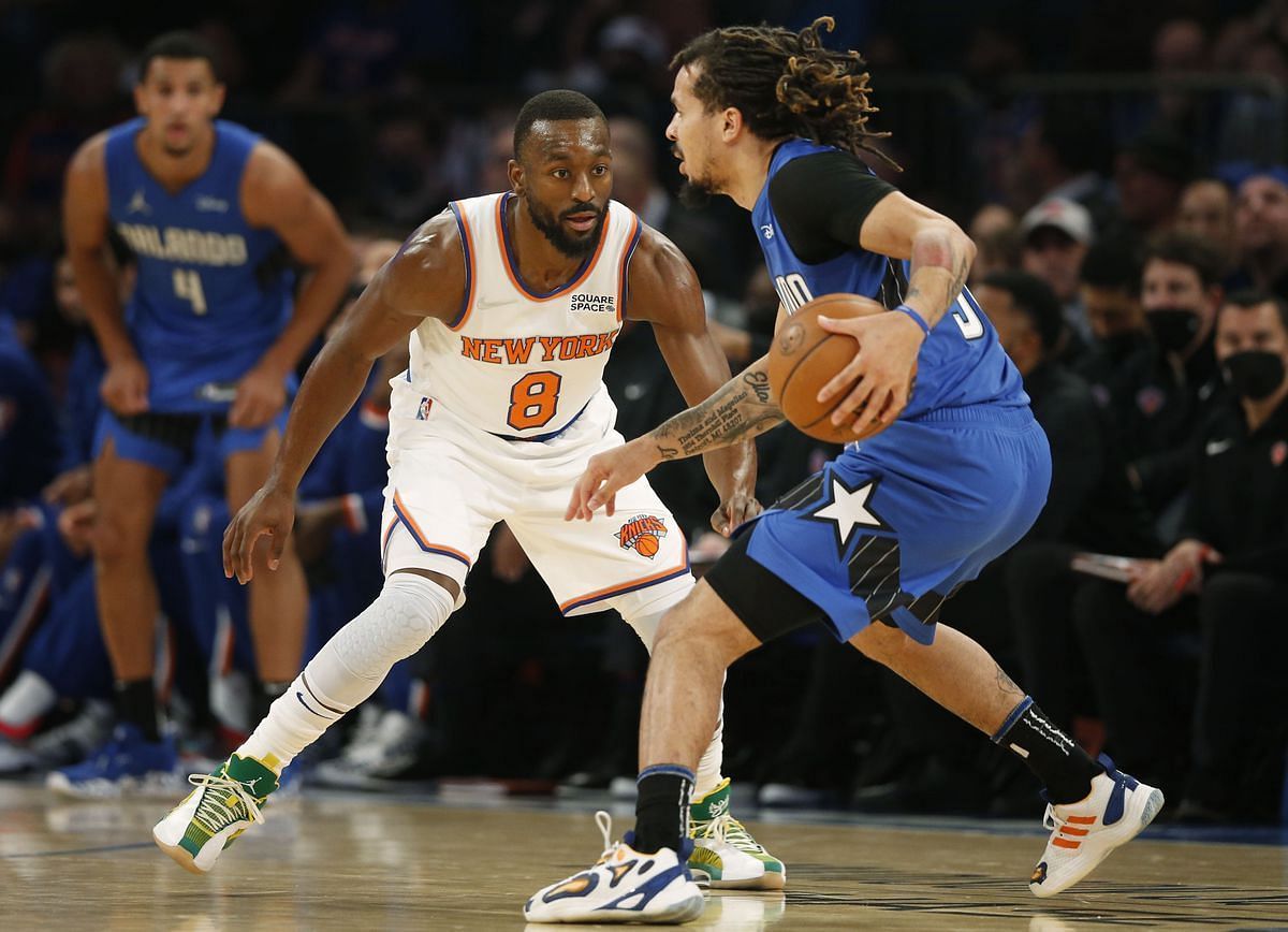 Kemba Walker of the New York Knicks guarding Orlando Magic&#039;s Cole Anthony