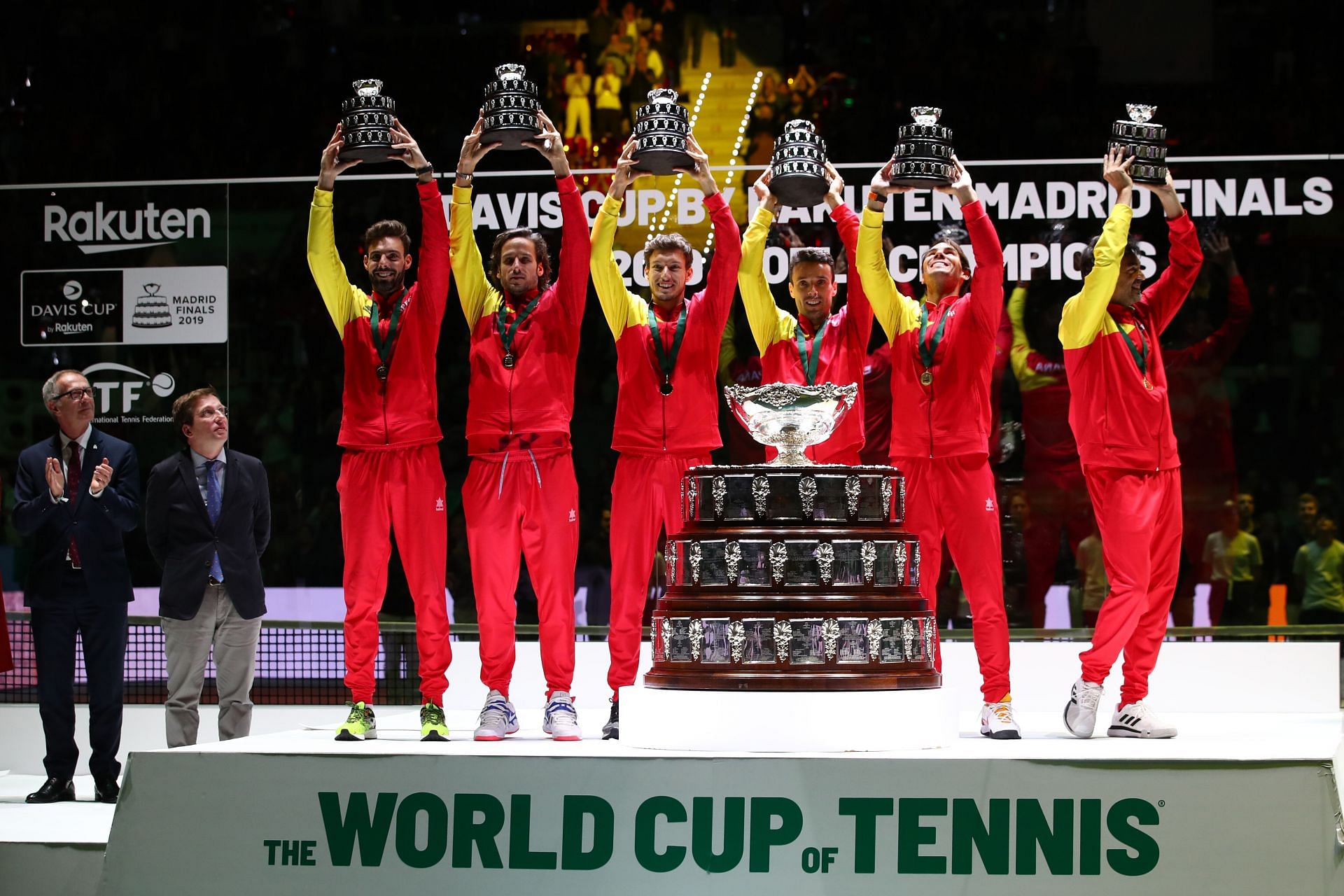 A victorious Spanish side, including Rafael Nadal, lift the 2019 Davis Cup title.