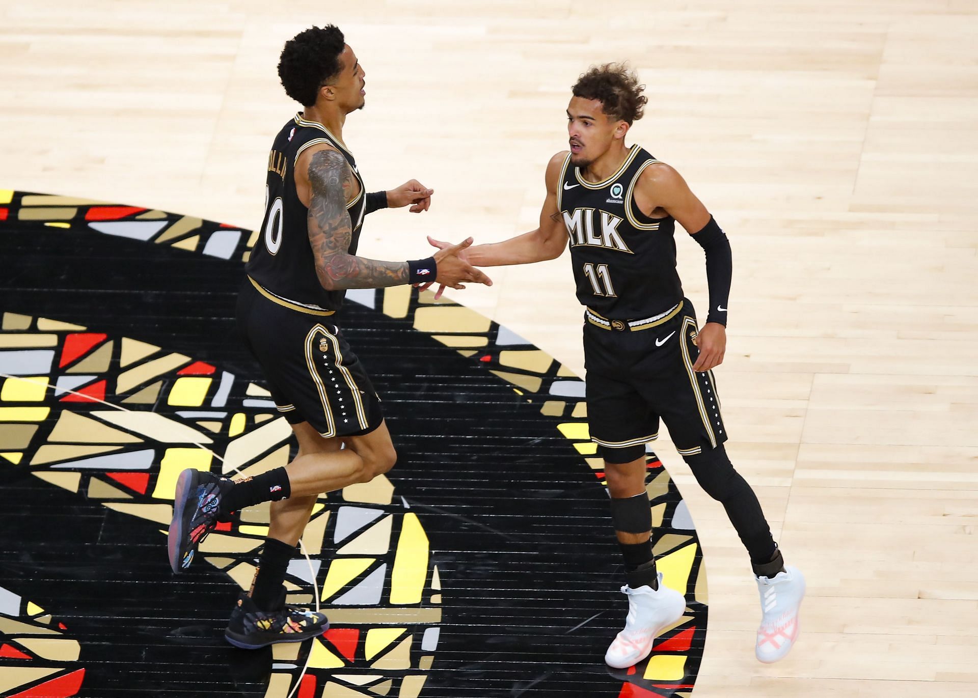 Trae Young (R, #11) reacts during OKC Thunder v Atlanta Hawks 2020-21 NBA season