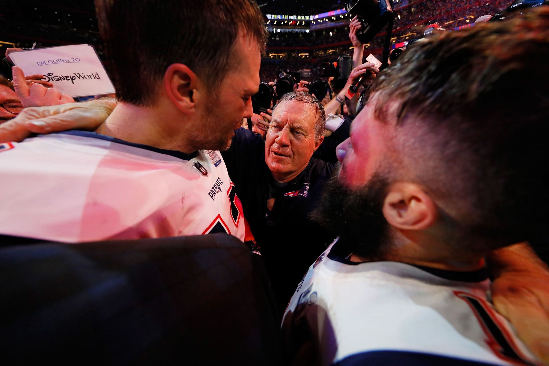 Bill Belichick (middle), Julian Edelman (right), and Tom Brady (left)