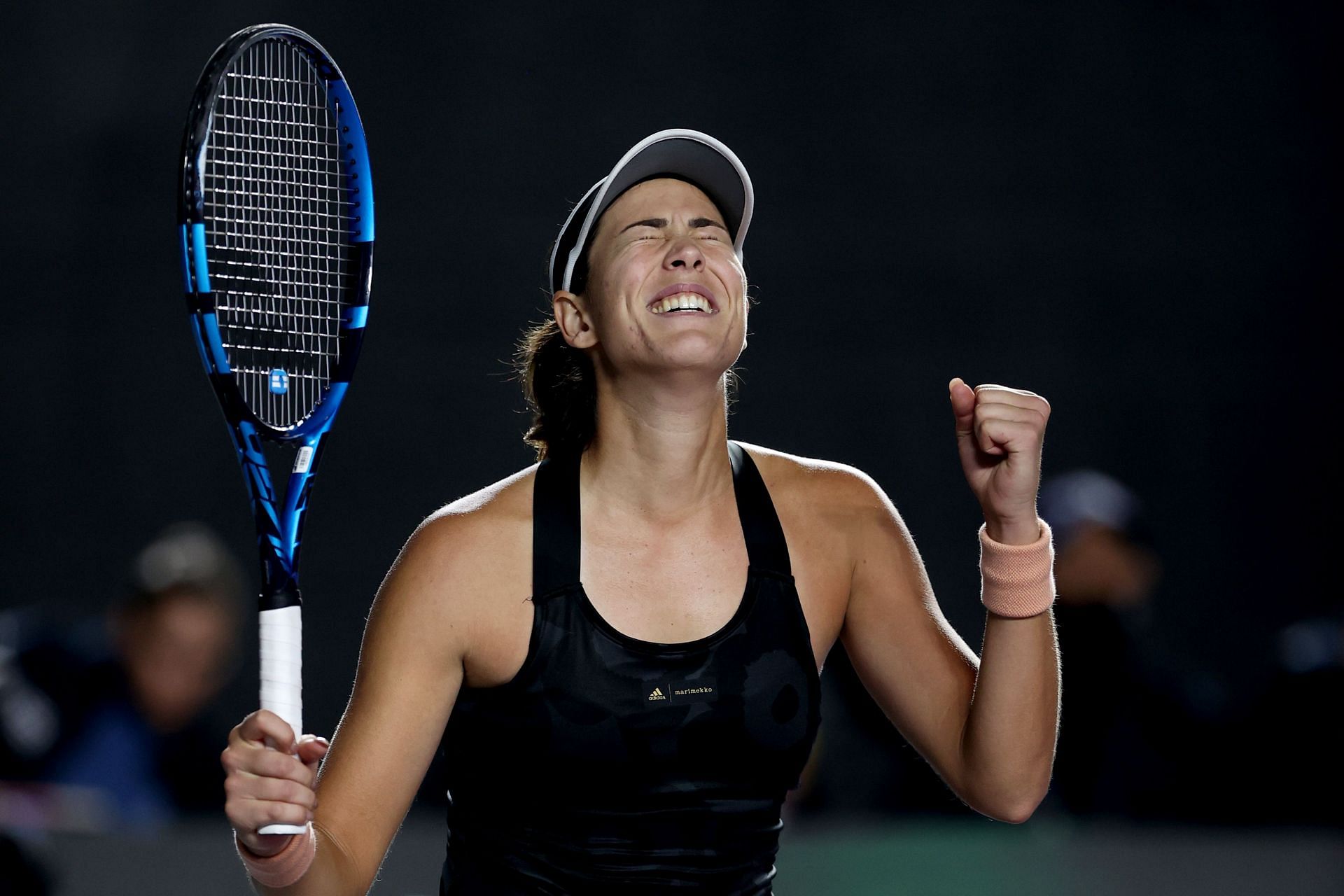 Garbine Muguruza qualified for the knockouts with her latest win.