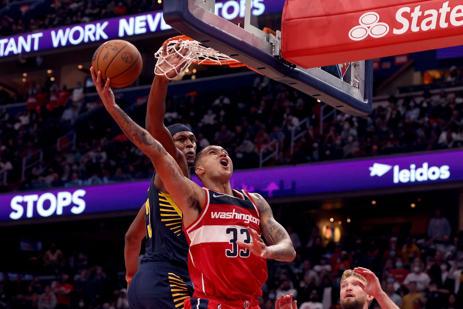 Kyle Kuzma goes for a lay-up during a game between the Indiana Pacers and the Washington Wizards.