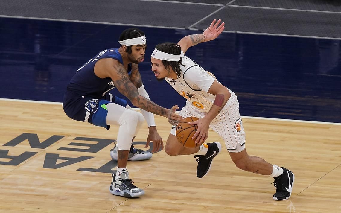 D&#039;Angelo Russell of the Minnesota Timberwolves guarding Orlando Magic&#039;s Cole Anthony [Source: USA Today]