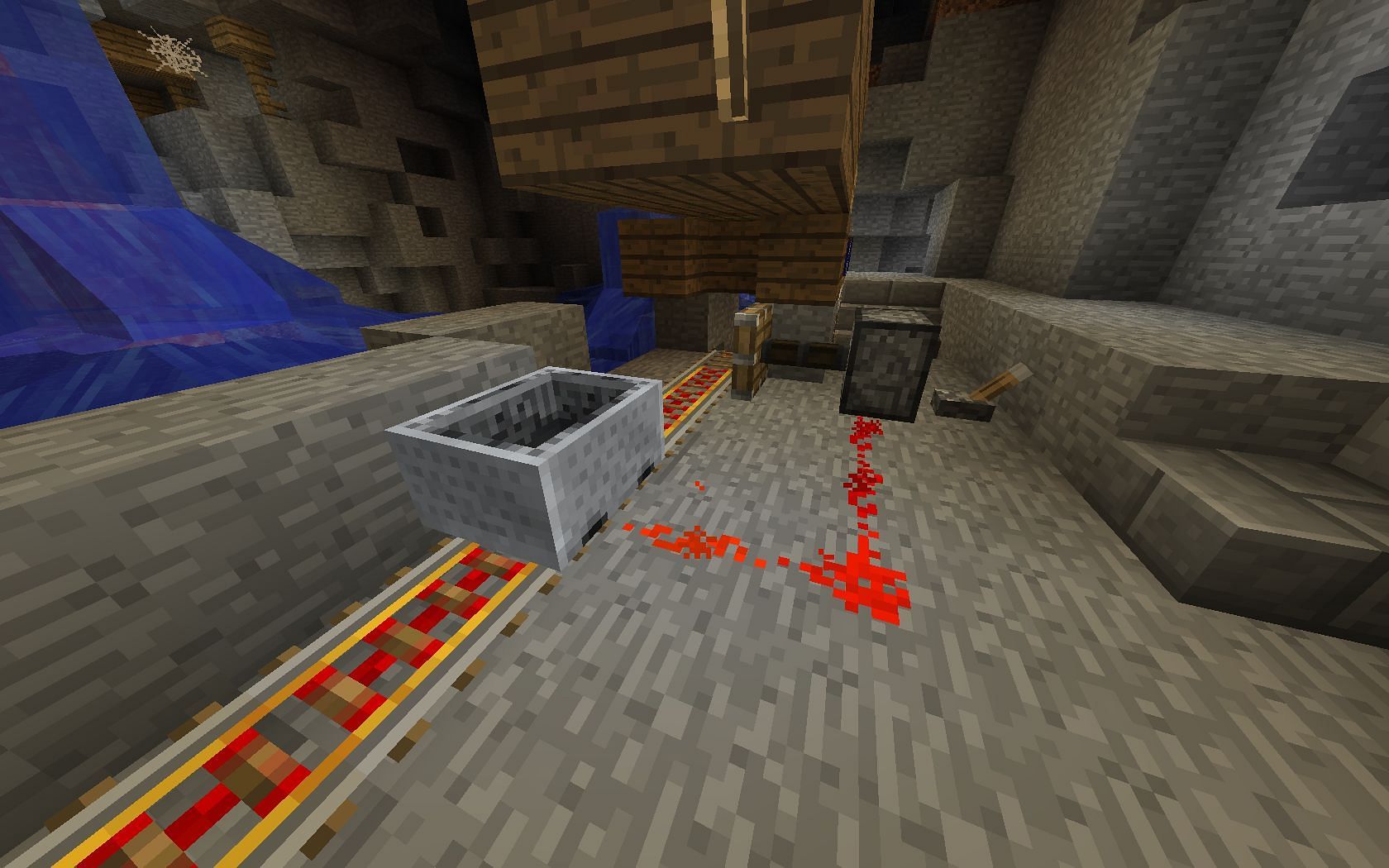 Detector rails will emit a redstone pulse when a cart goes over them. (Image via Minecraft)