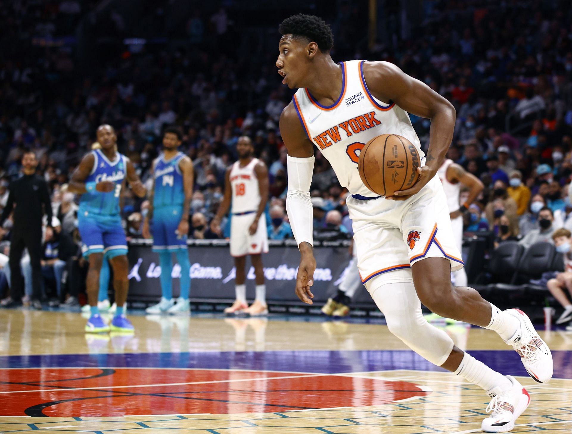 RJ Barrett of the New York Knicks dribbles during the second half of their game against the Charlotte Hornets at Spectrum Center on November 12, 2021 in Charlotte, North Carolina.