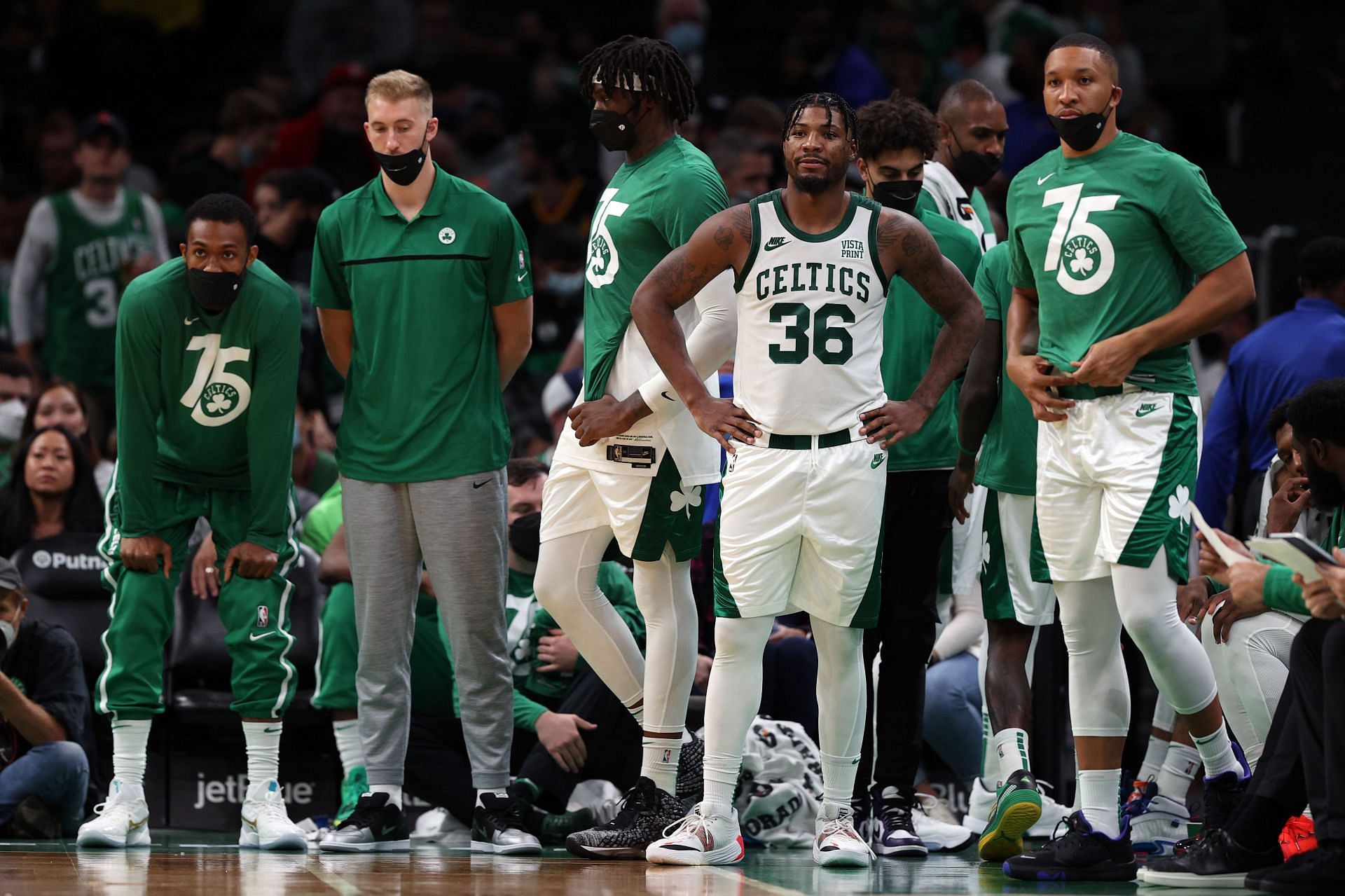 The Boston Celtics bench looks on at the game against the Toronto Raptors