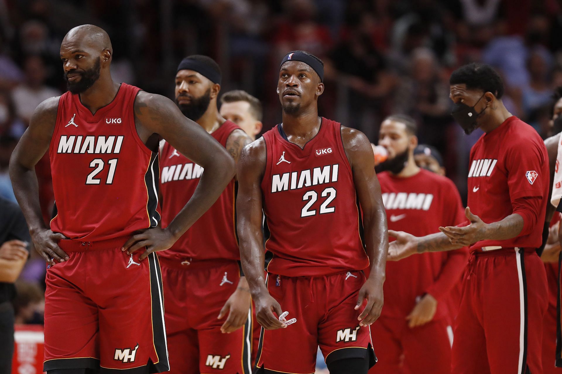 Miami Heat enter the game against the Milwaukee Bucks after a timeout