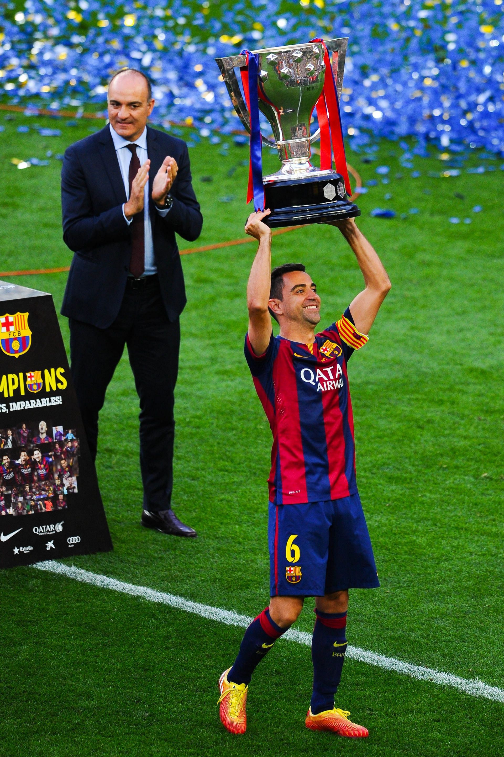 Xavi lifts La Liga; Guardiola stopped him from leaving for Bayern Munich in 2008.