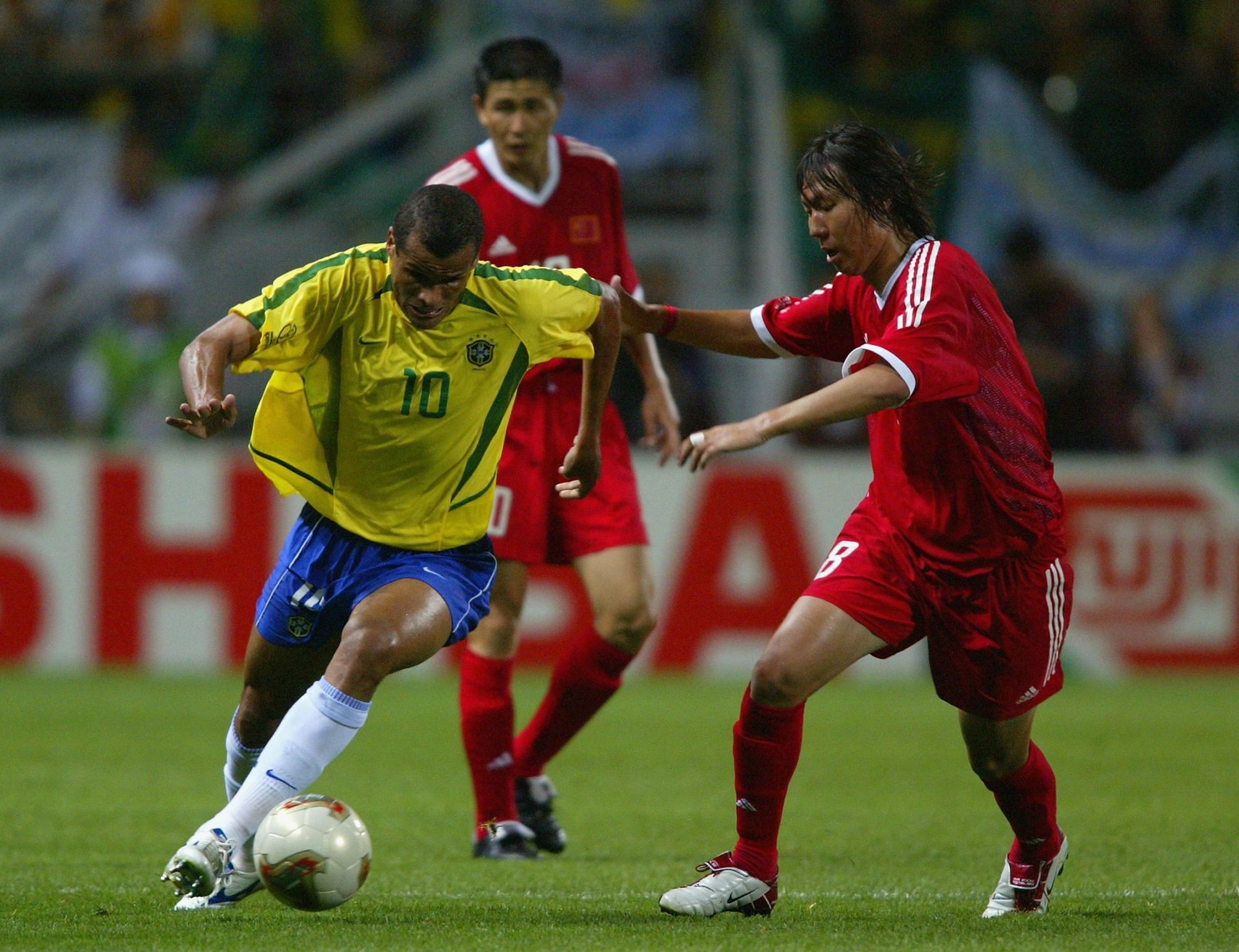 Rivaldo of Brazil and Tie Li of China