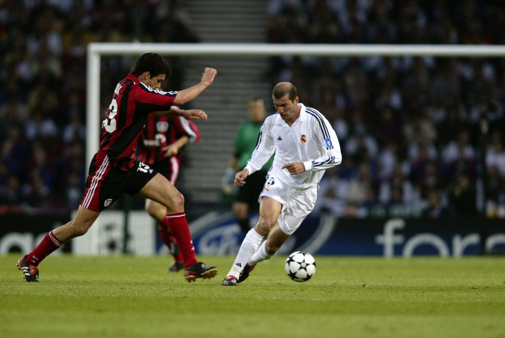Zinedine Zidane of Real Madrid and Michael Ballack of Bayer Leverkusen