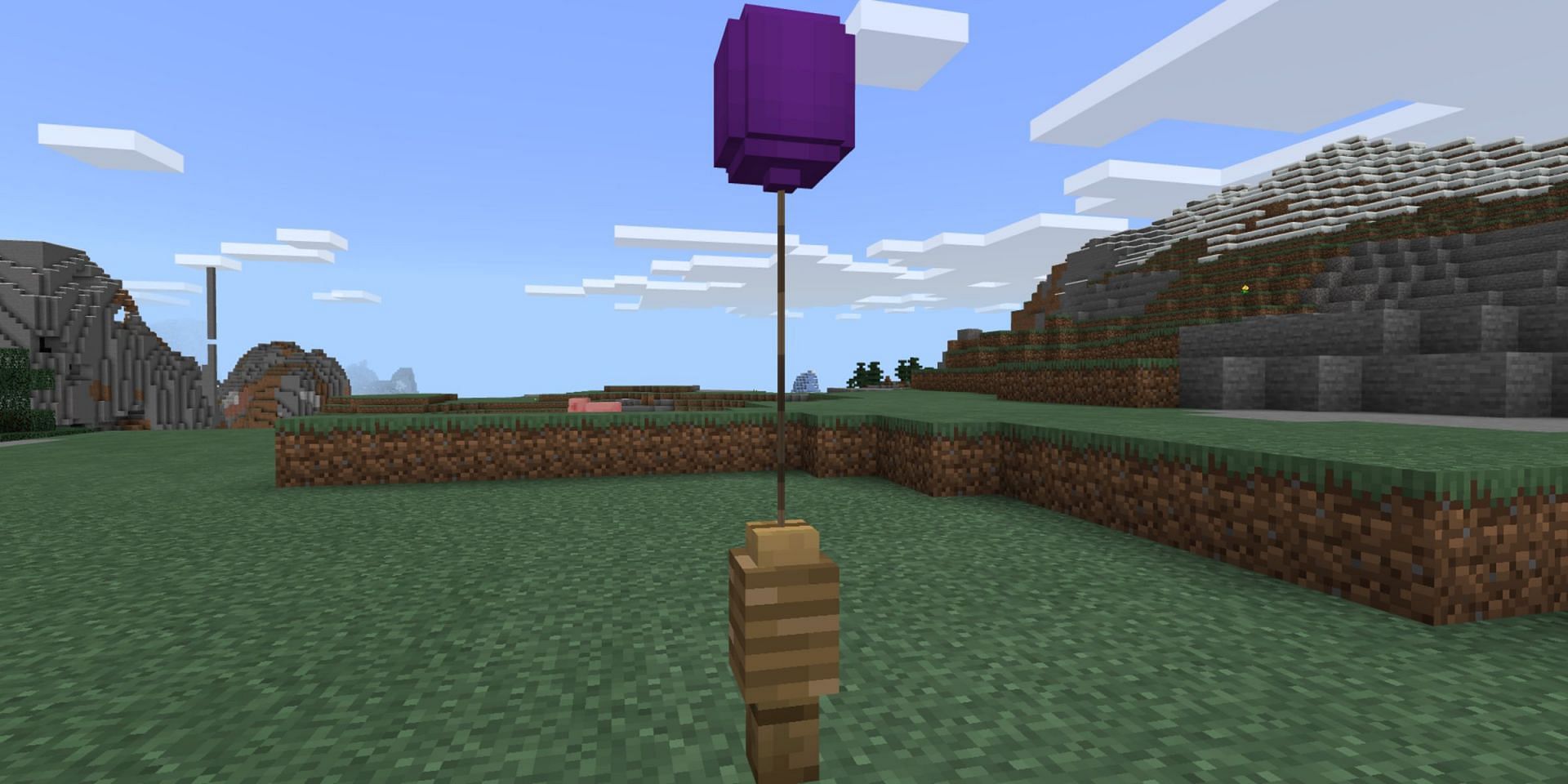 Balloons can attach to objects in a similar fashion to leads (Image via Mojang)