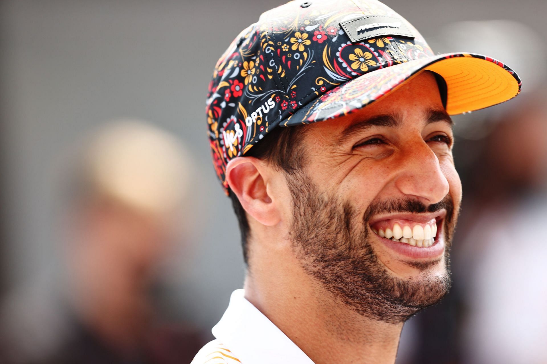 Daniel Ricciardo of McLaren looks on in the paddock