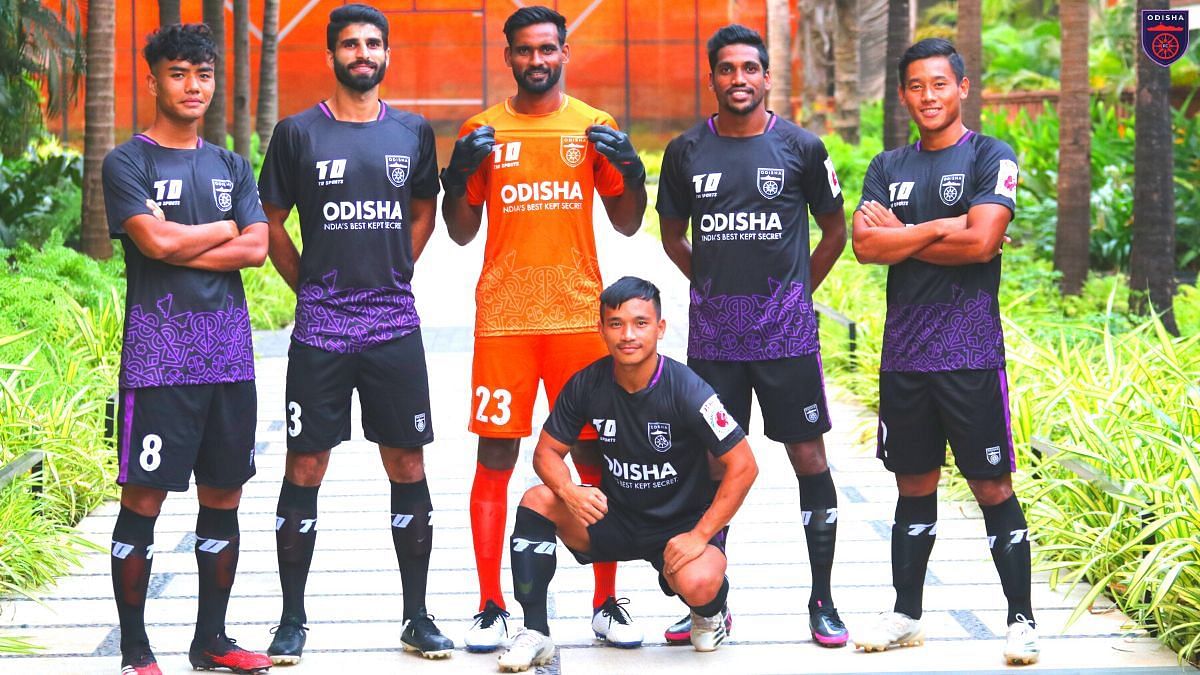 Odisha players pose for a photo with their new jersey - Image Courtesy: OFC Media