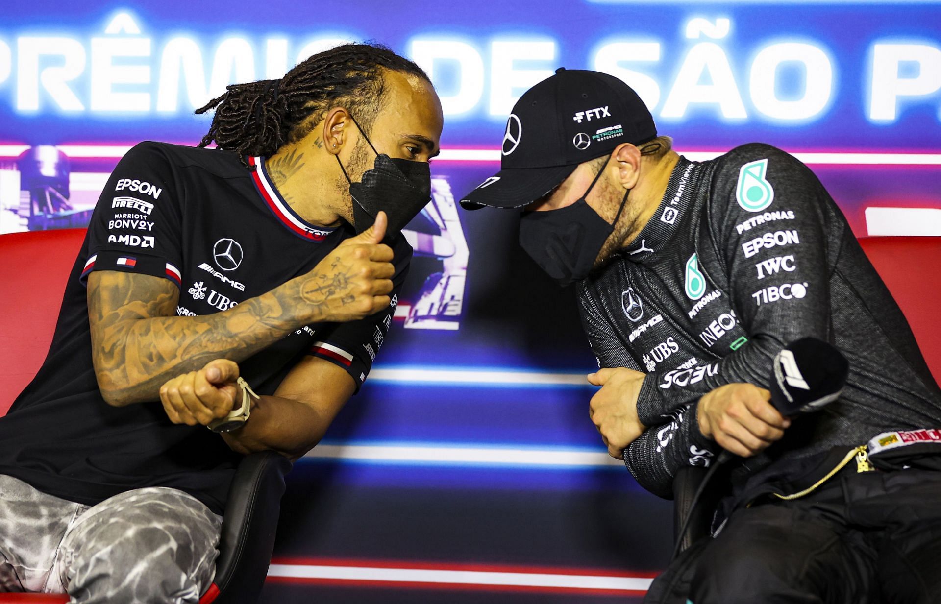 Lewis Hamilton and Valtteri Bottas in a press conference. (Photo by Buda Mendes/Getty Images)