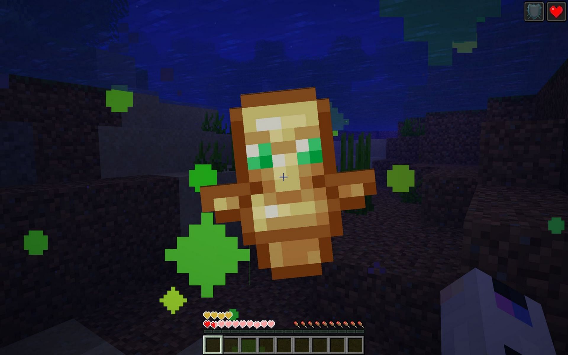 Totems of Undying prevent death for the user that is currently holding it. (Image via Minecraft)