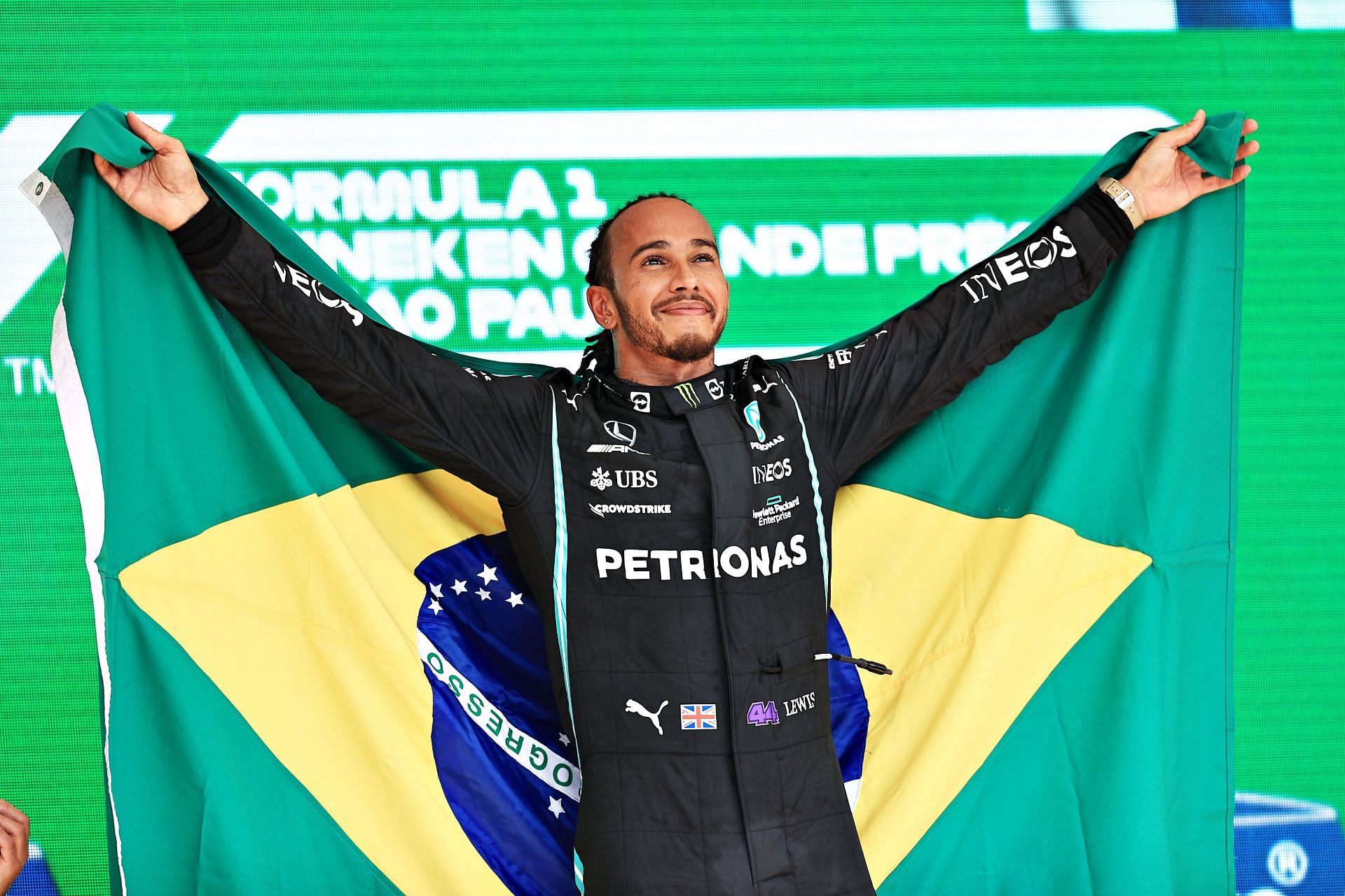 Race winner Lewis Hamilton celebrates on the podium during the F1 Grand Prix of Brazil in Sao Paulo. (Photo by Mark Thompson/Getty Images)