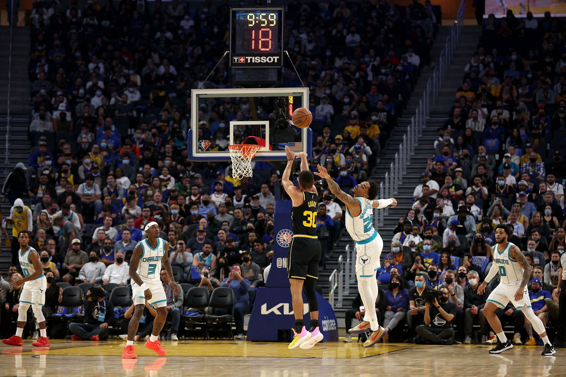Stephen Curry hitting a three-pointer against the Charlotte Hornets