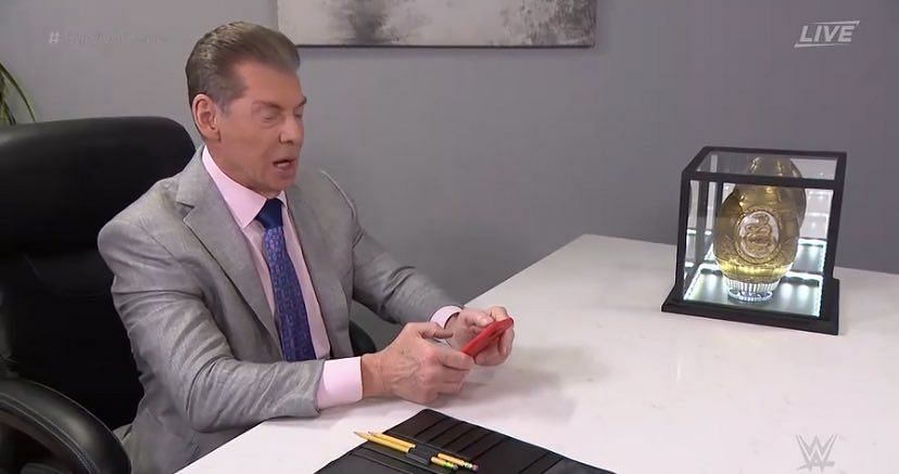 Do you think Vince McMahon is texting someone about his egg?