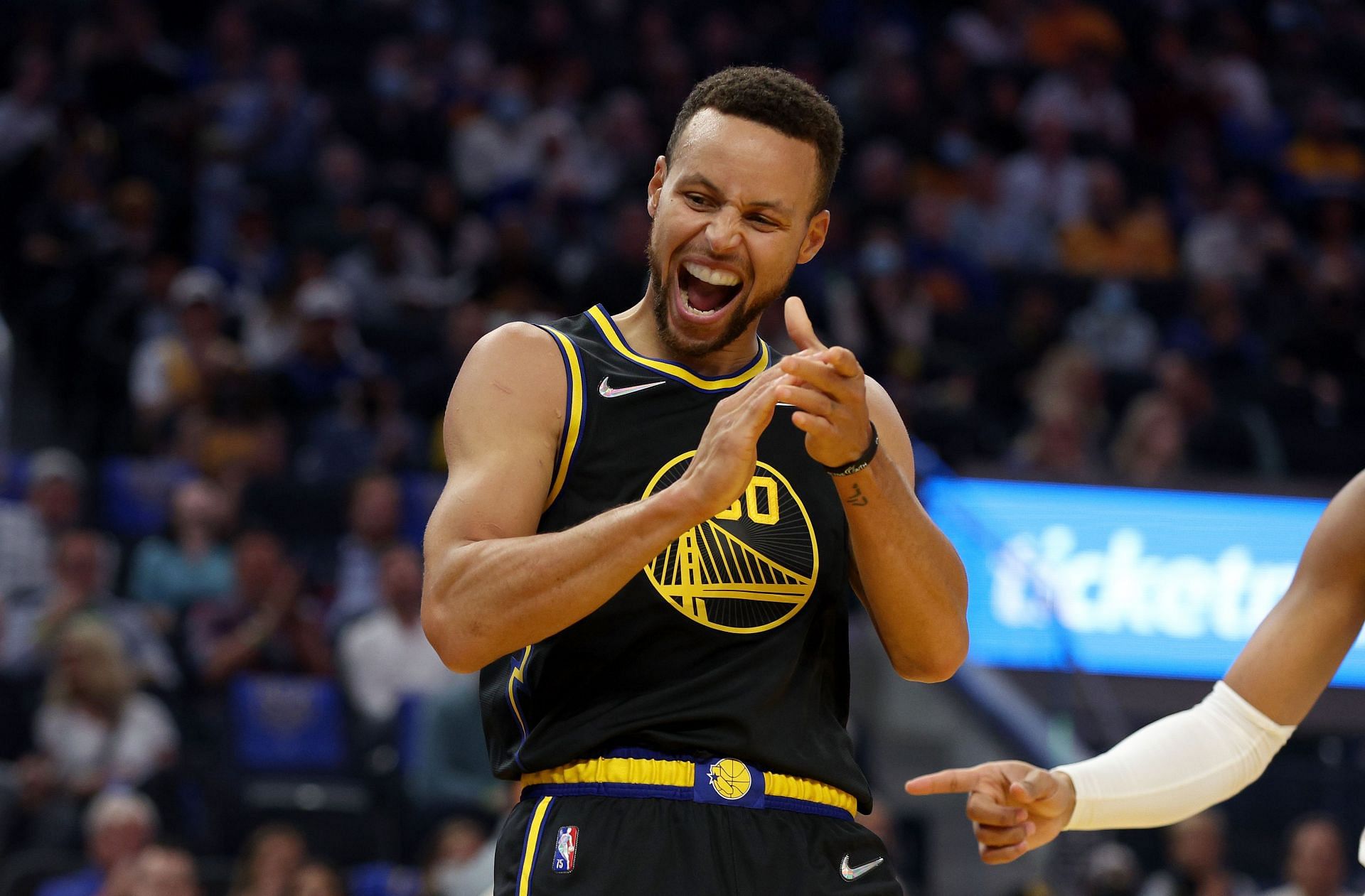 Stephen Curry of the Golden State Warriors celebrates during a game.