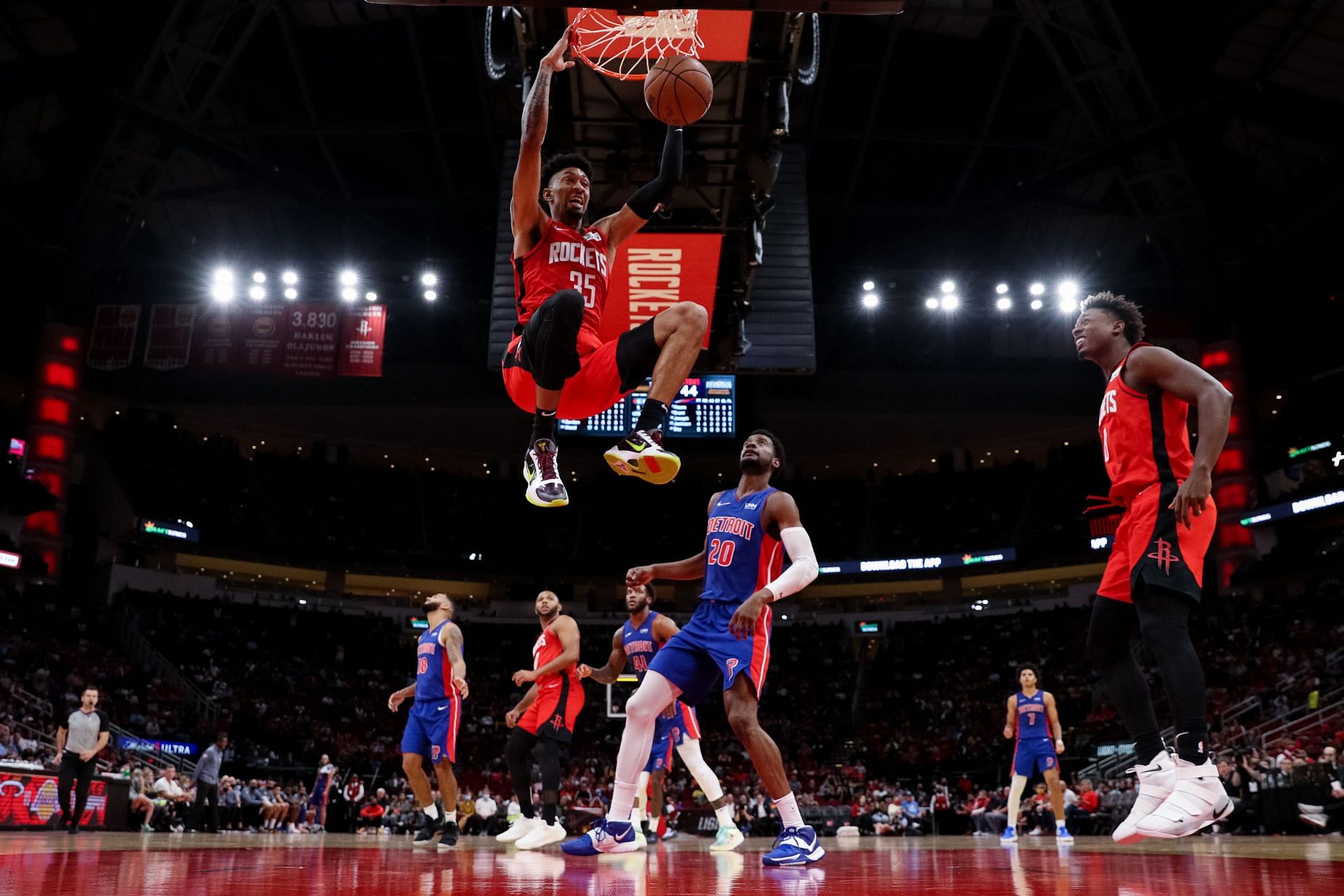 Christian Wood scores with a dunk at the Detroit Pistons v Houston Rockets game