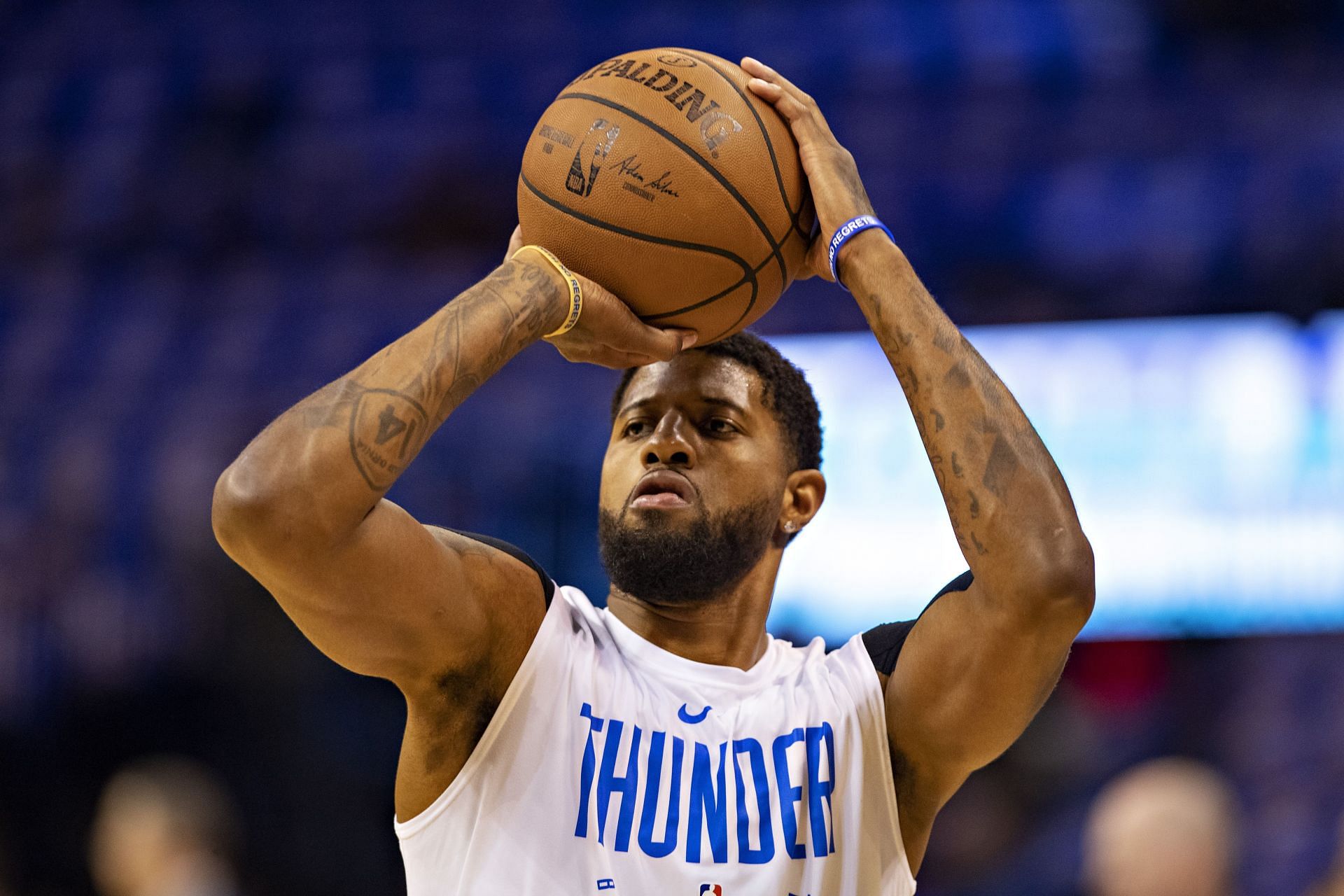 Paul George #13 of the Oklahoma City Thunder warms up before a game against the Portland Trail Blazers during Round One Game Three of the 2019 NBA Playoffs on April 21, 2019 at Chesapeake Energy Arena in Oklahoma City, Oklahoma.