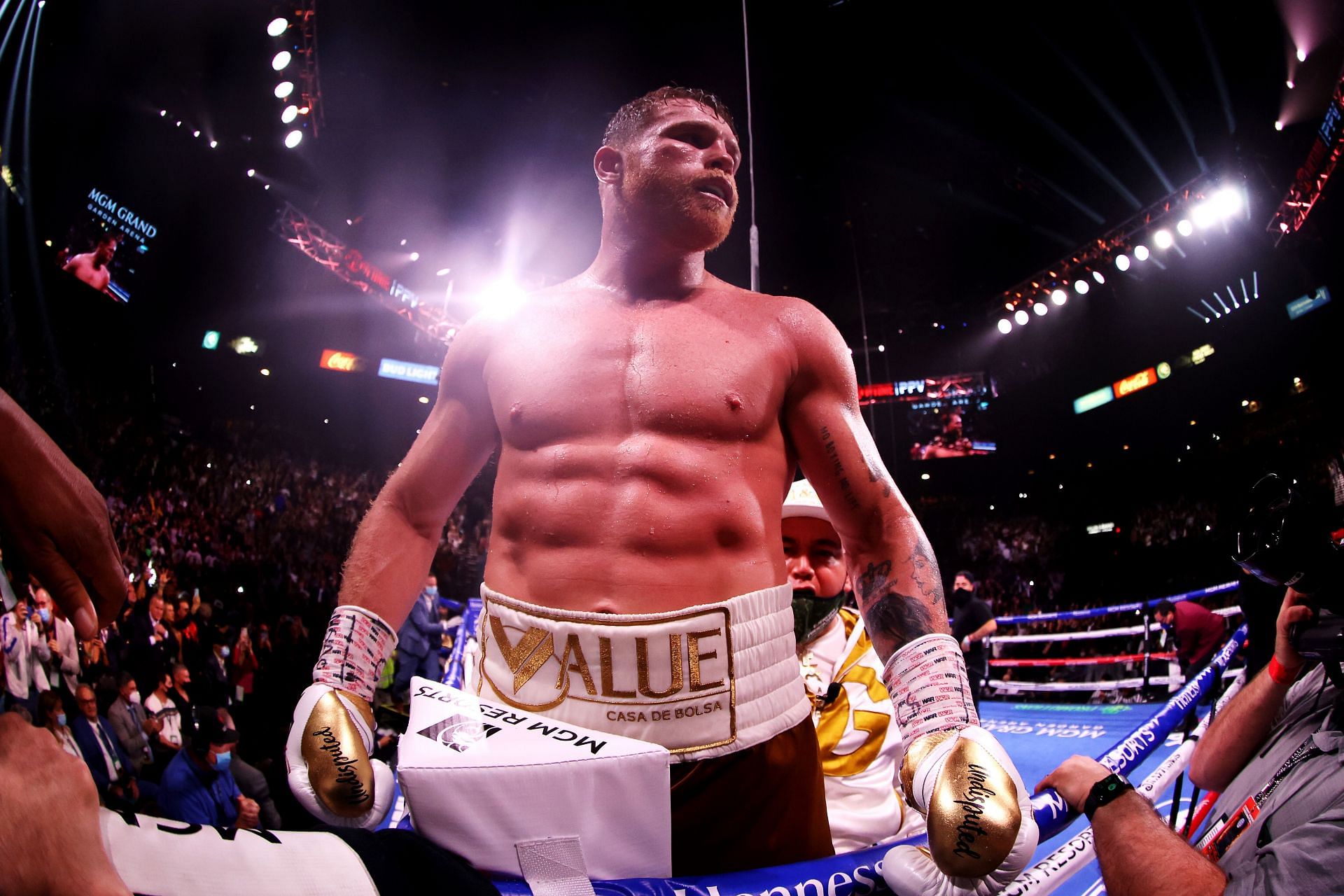 Canelo Alvarez celebrating victory against Caleb Plant