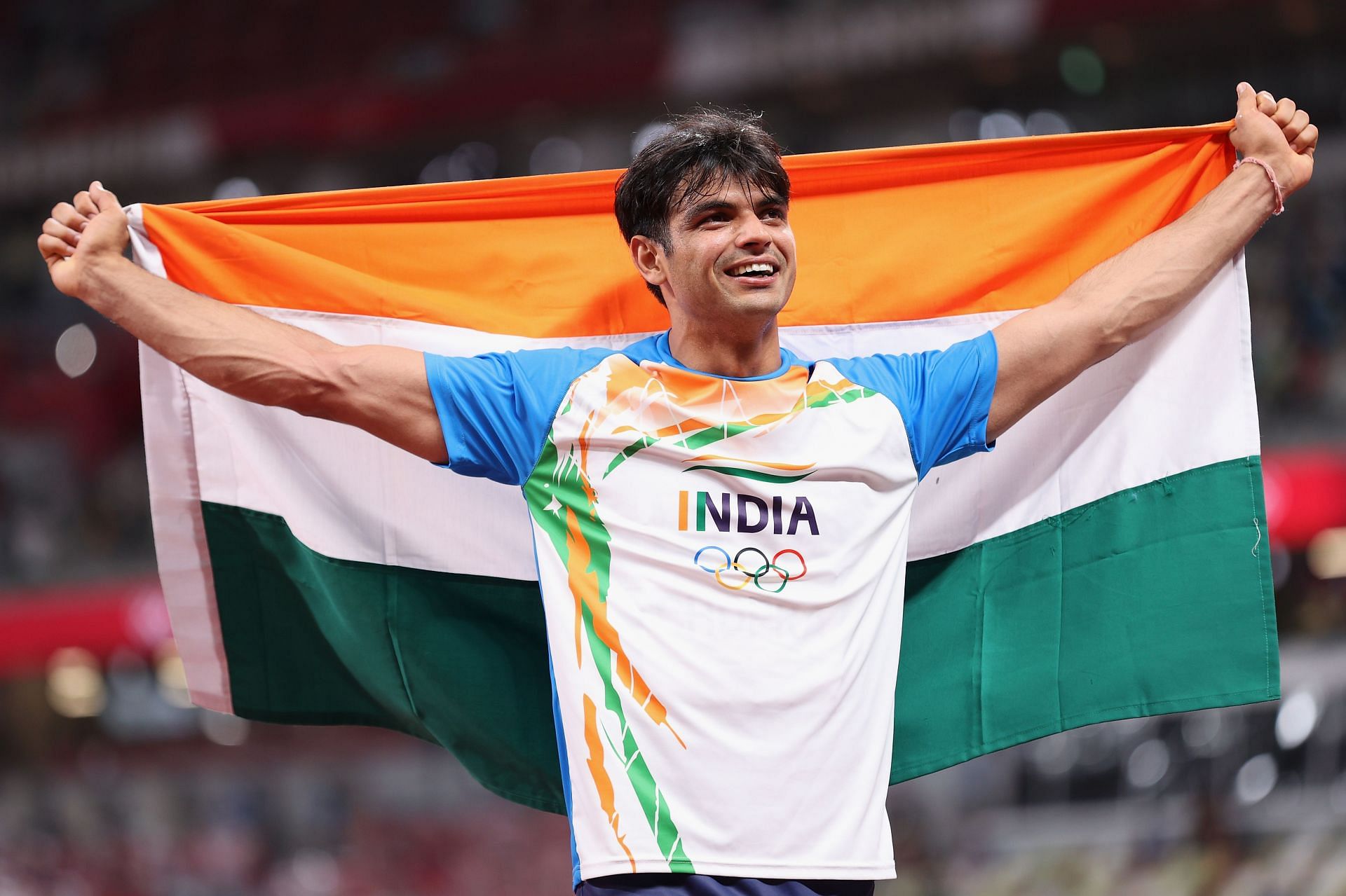 Neeraj Chopra celebrating after winning the gold medal at the Tokyo Olympics