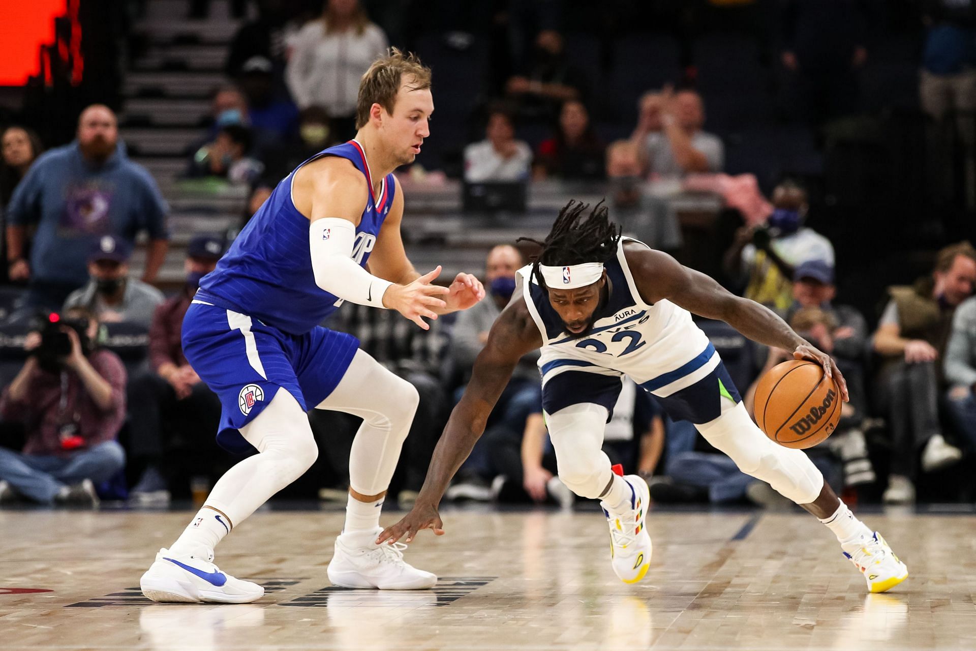 Luke Kennard of the Los Angeles Clippers and Patrick Beverley of the Minnesota Timberwolves.