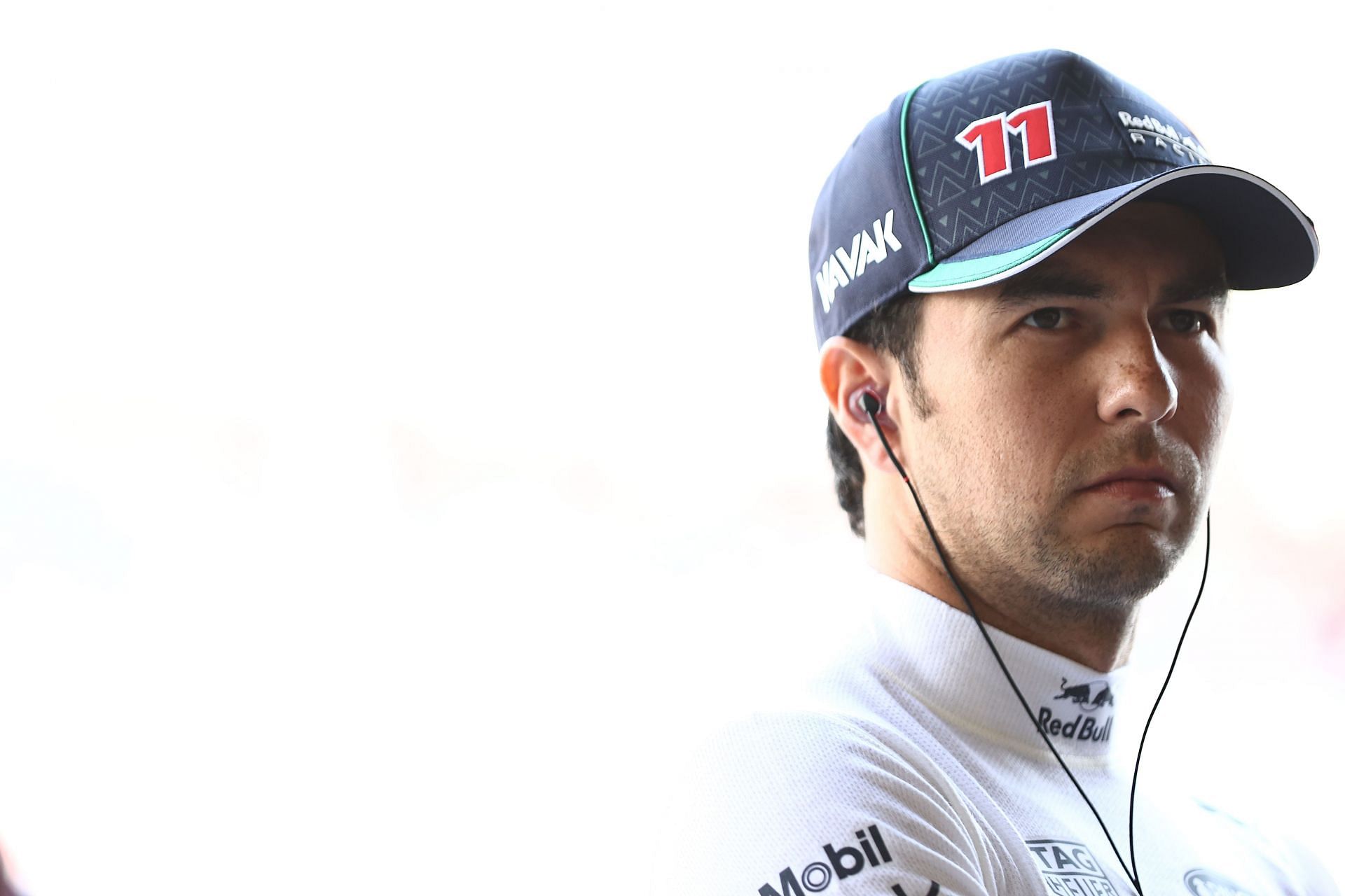 Sergio Perez prepares to drive in the garage during practice ahead of the 2021 Mexican GP. (Photo by Mark Thompson/Getty Images)