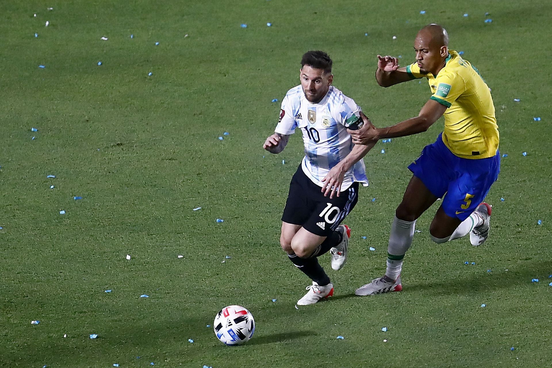 Fabinho tracks Lionel Messi during Argentina v Brazil 