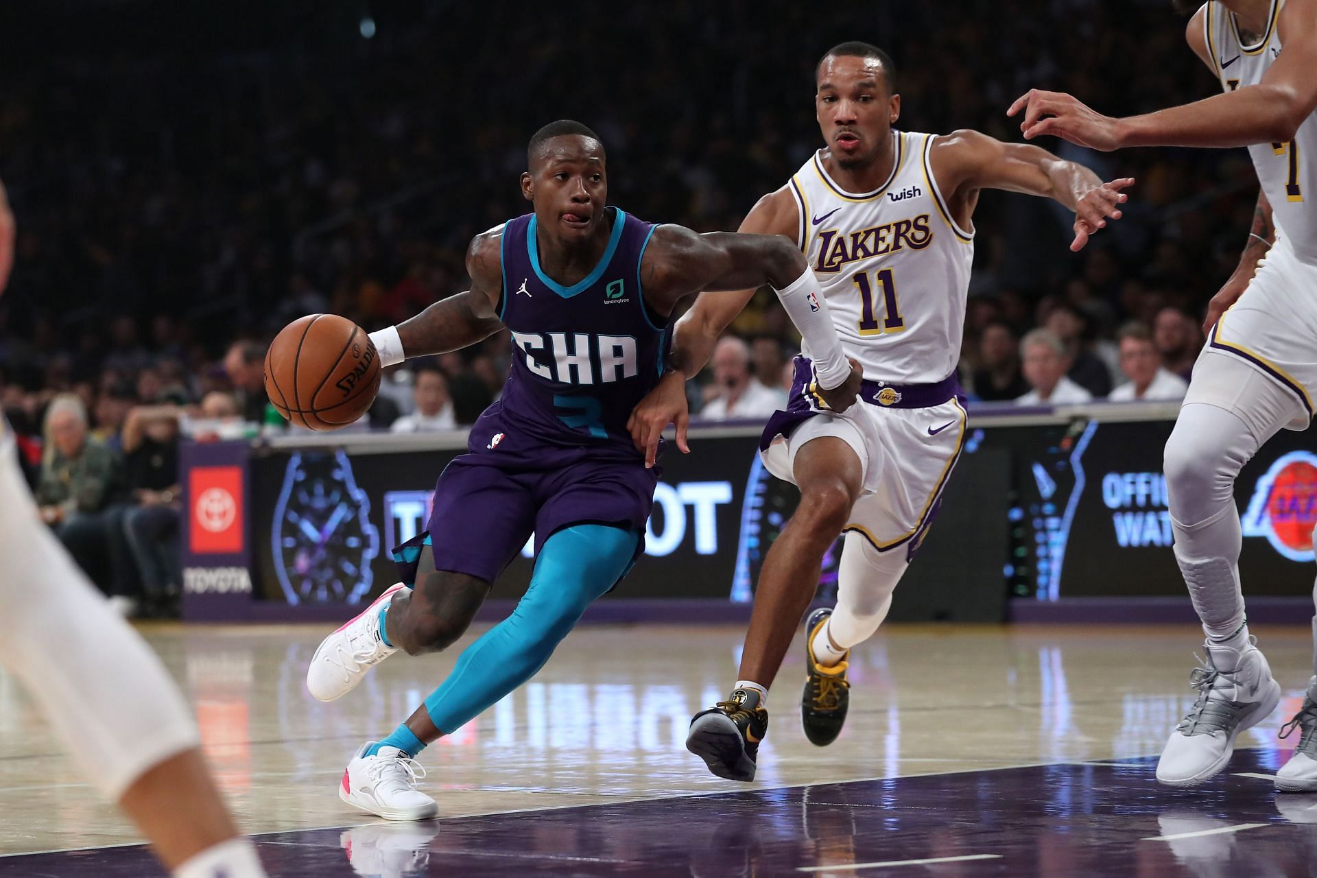 Terry Rozier of the Charlotte Hornets drives against Avery Bradley of the LA Lakers