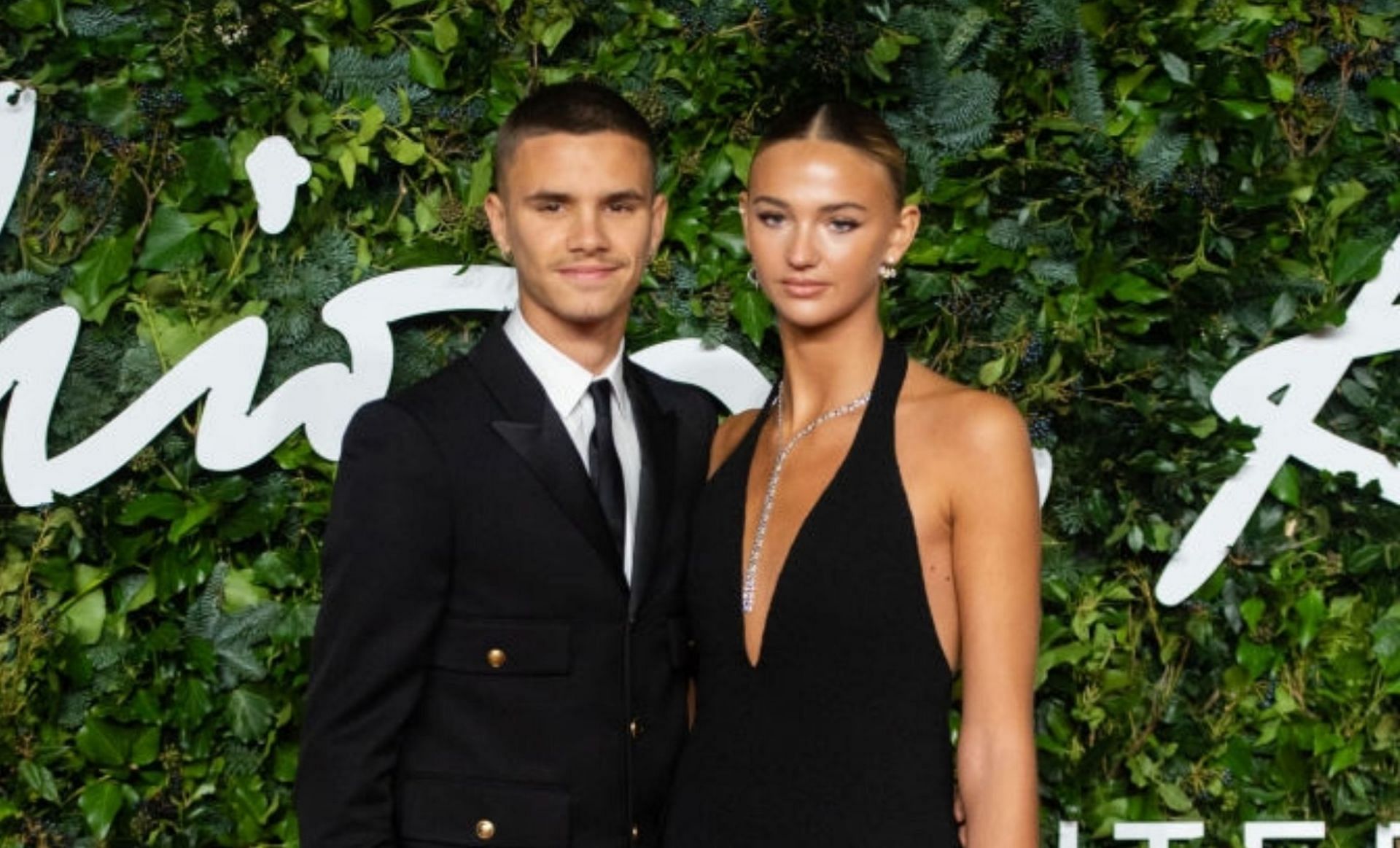 Romeo Beckham and Mia Regan at the British Fashion Awards(image via getty)