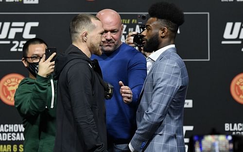 Petr Yan (left), Dana White (center) & Aljamain Sterling (right)