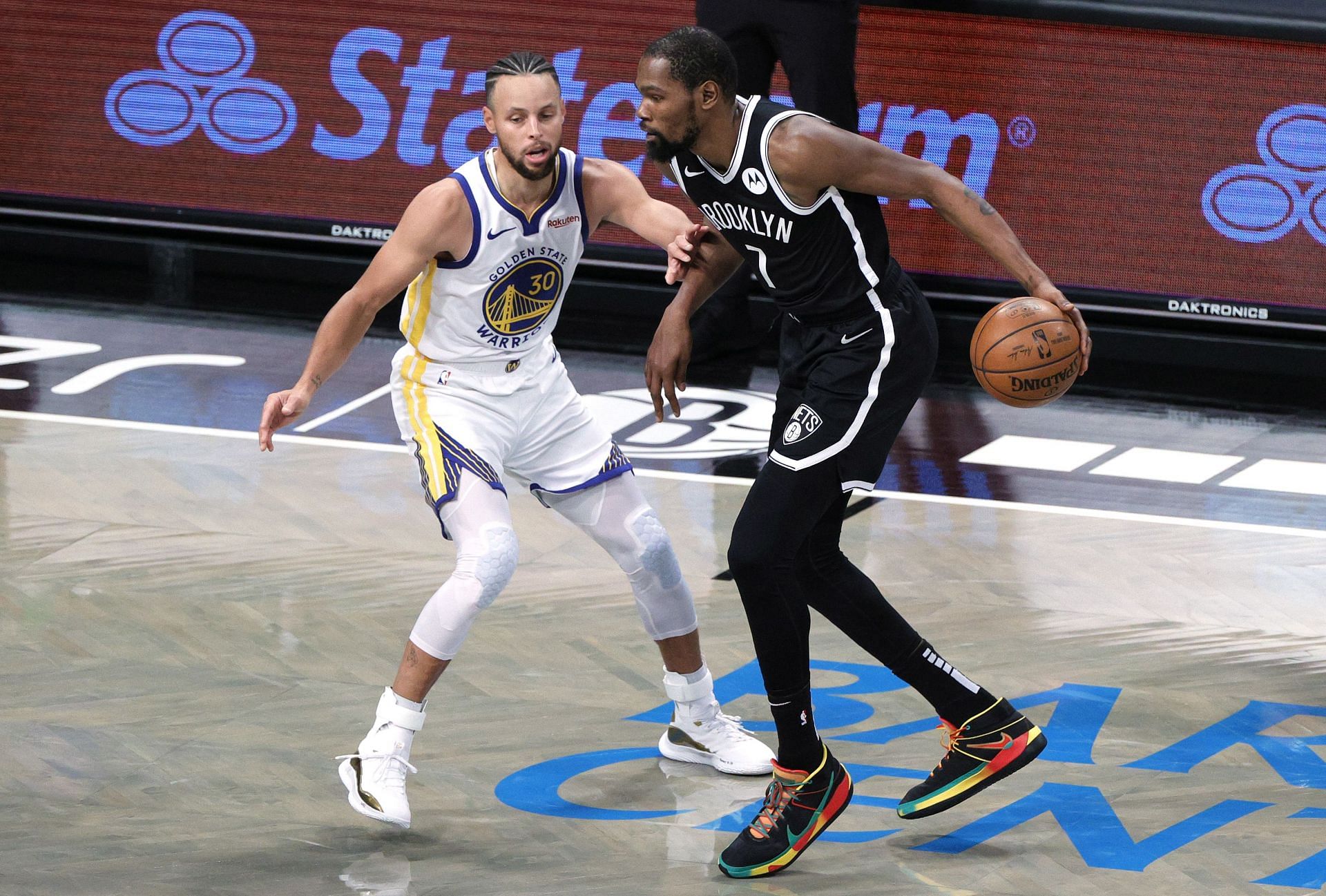 Stephen Curry of the Golden State Warriors guarding Kevin Durant of the Brooklyn Nets.