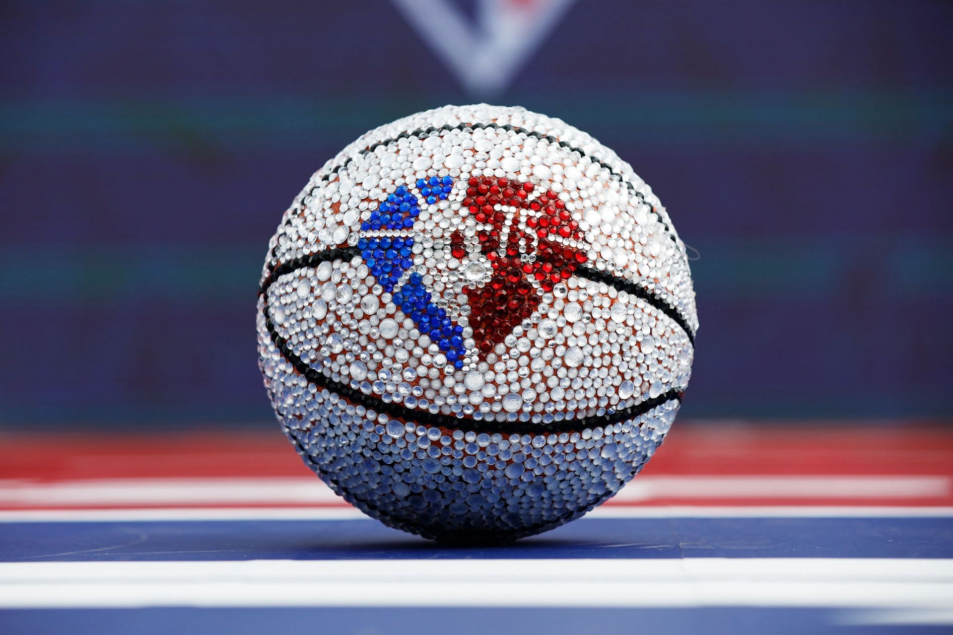 A jewel encrusted basketball with NBA 75th anniversary detail.