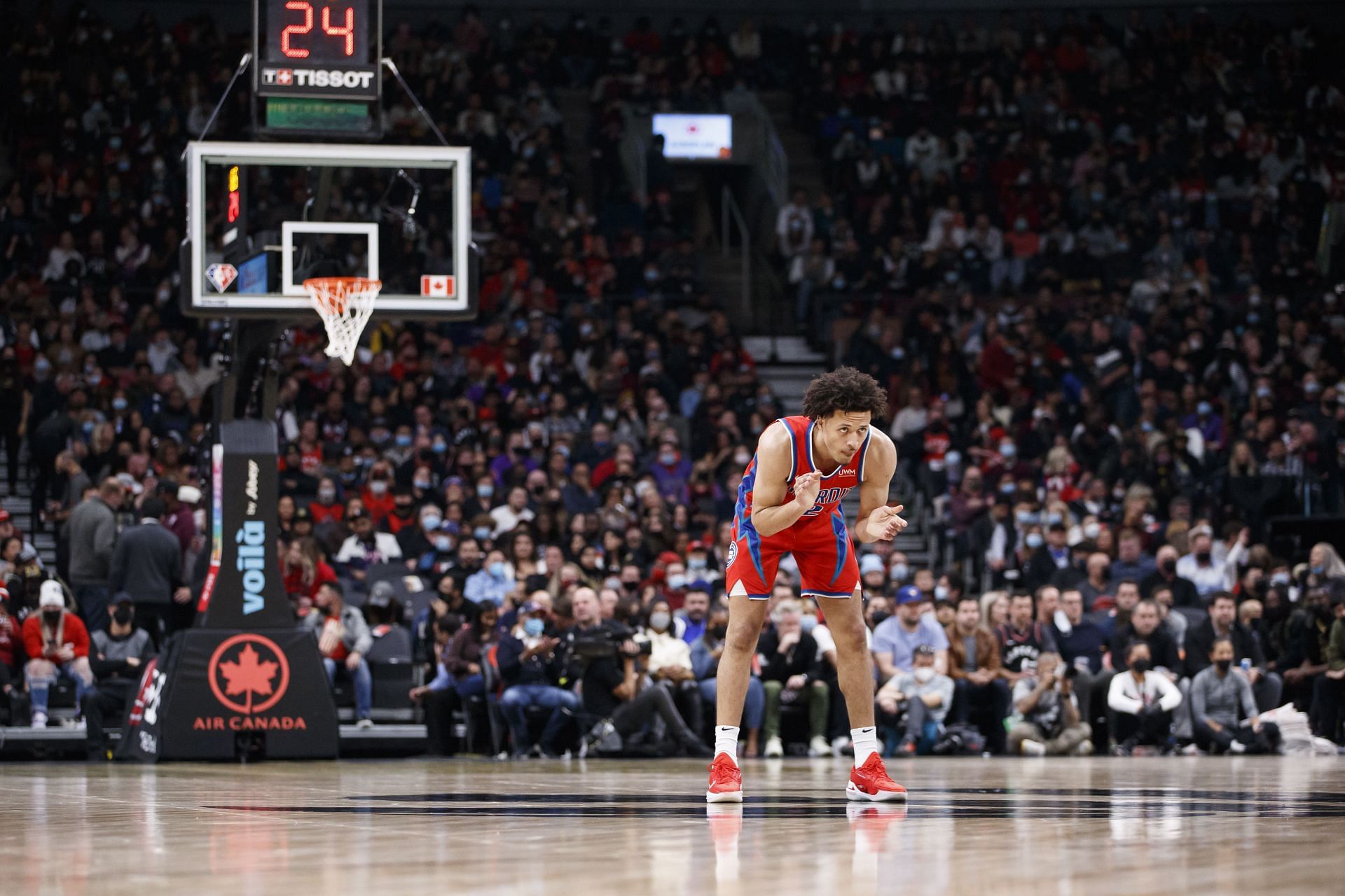 Cade Cunningham looks on at the Detroit Pistons v Toronto Raptors game