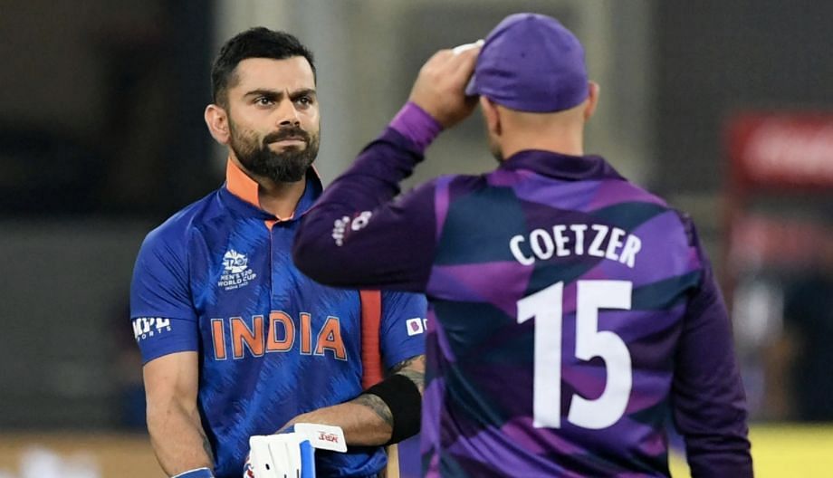 Virat Kohli and Kyle Coetzer after the India-Scotland match.