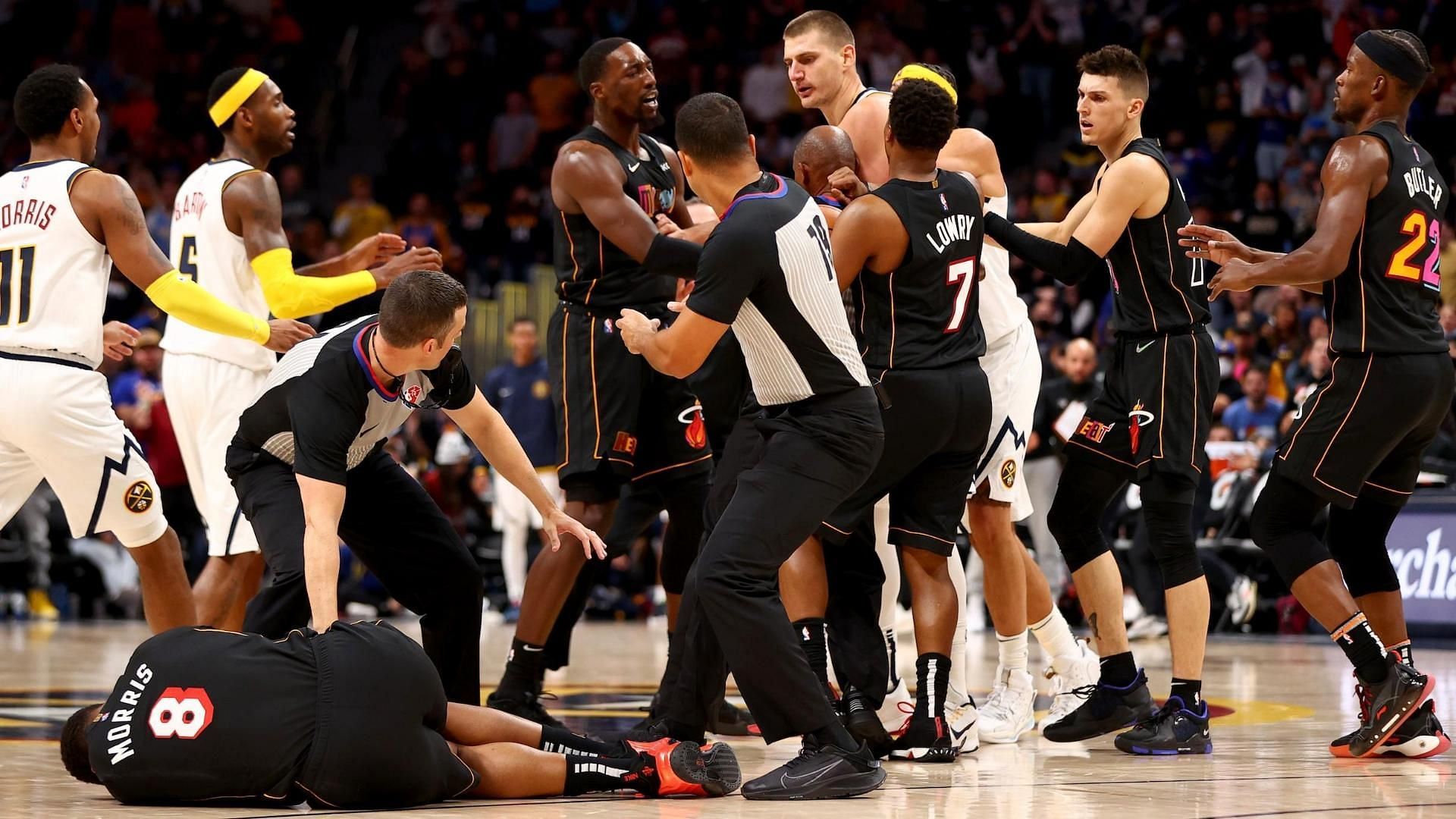 Markieff Morris is crumpled on the floor after getting blindsided by NBA MVP Nikola Jokic [Photo: ESPN]