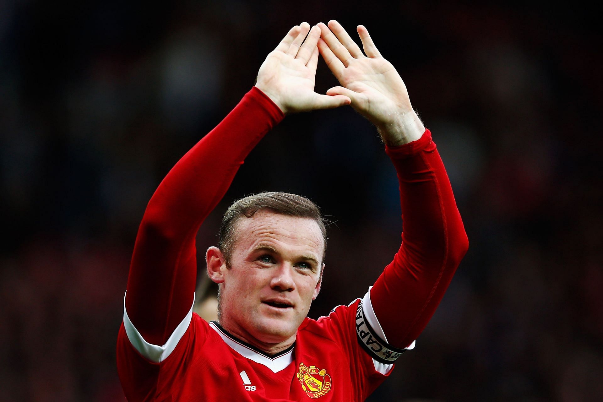 Wayne Rooney acknowledges the home suppiort at Manchester United&#039;s Old Trafford stadium..