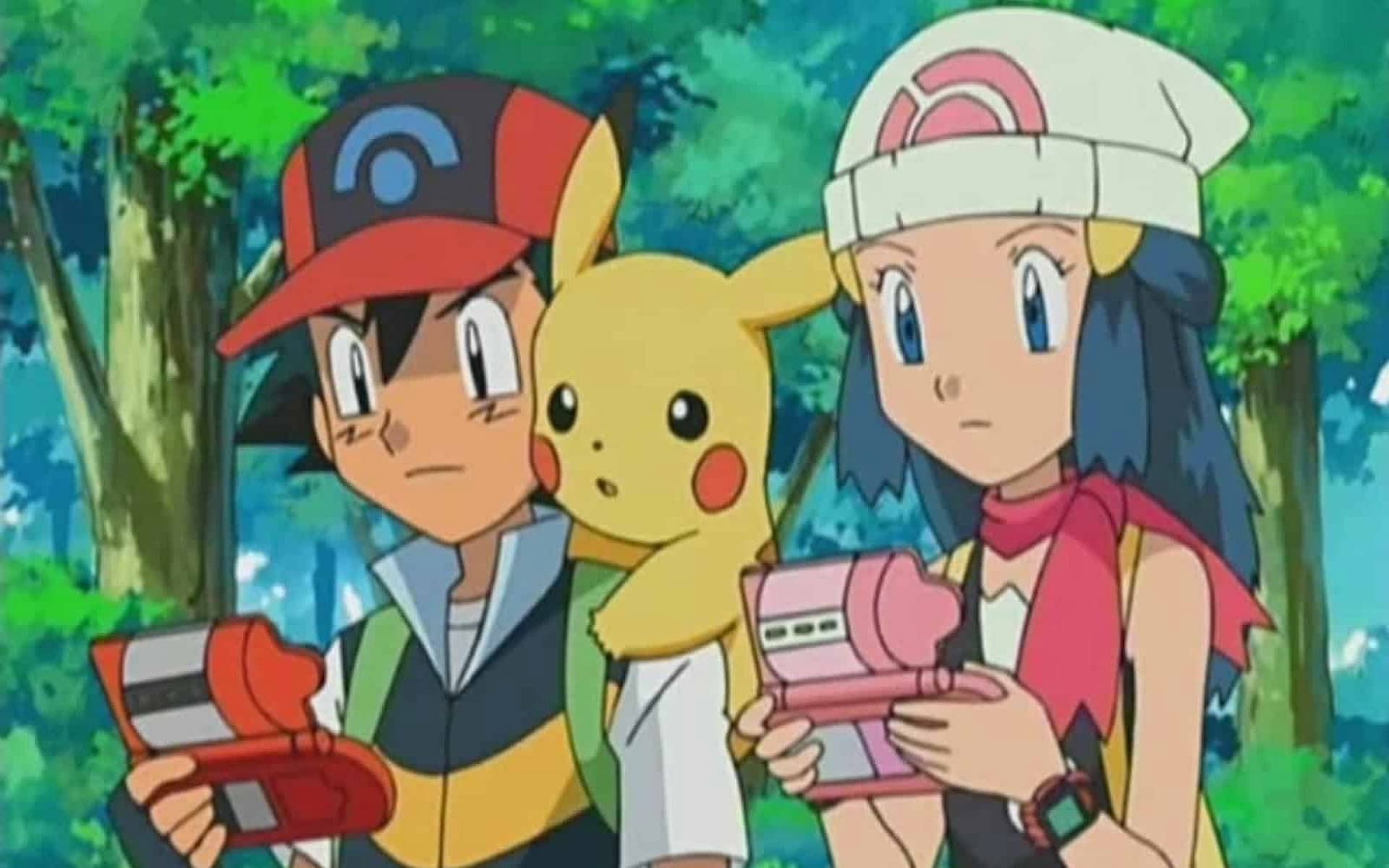 Ash and Dawn looking at their Pokedex in the anime. (Image via The Pokemon Compan