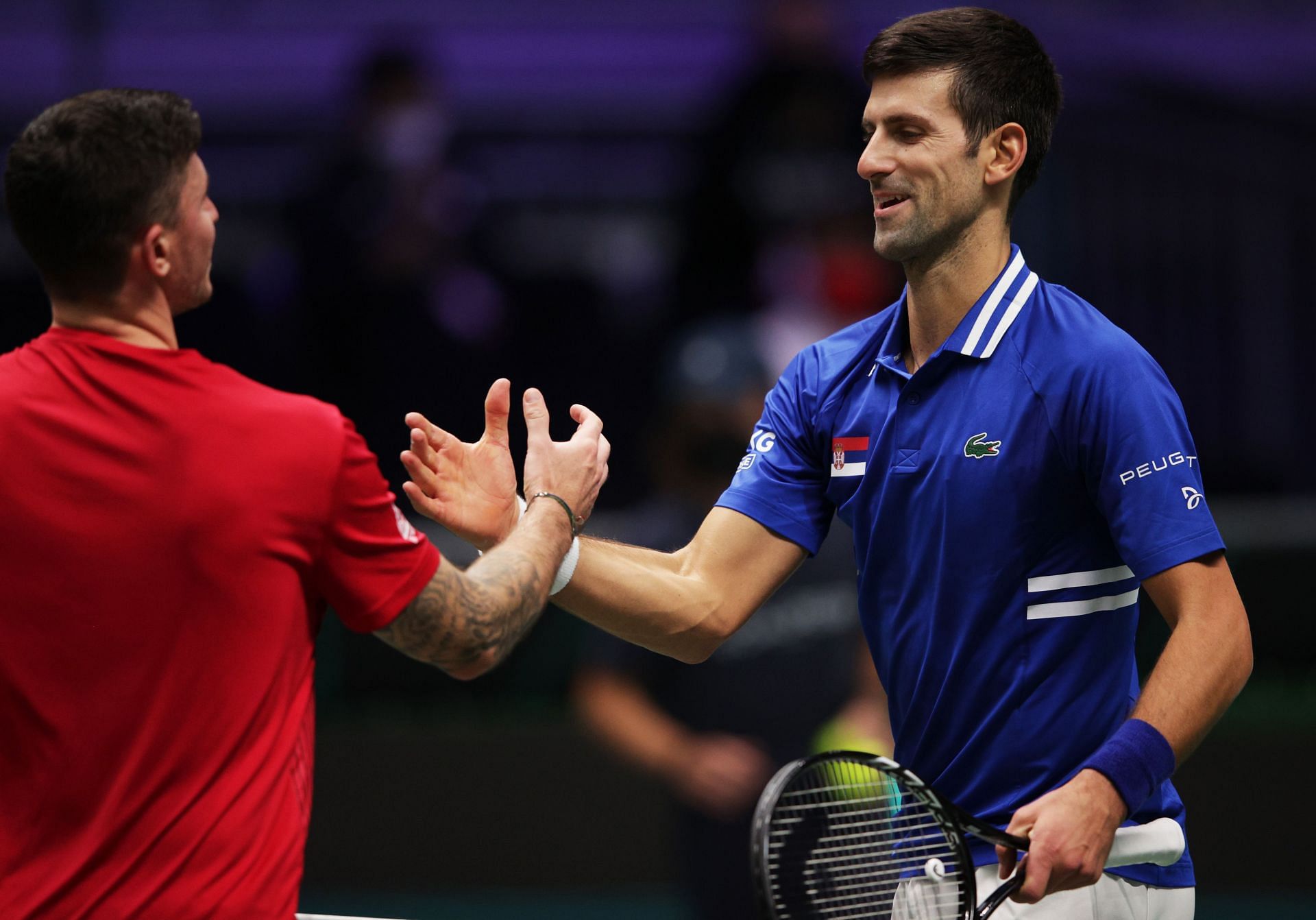 Novak Djokovic and Dennis Novak after their match at the Davis Cup Finals 2021